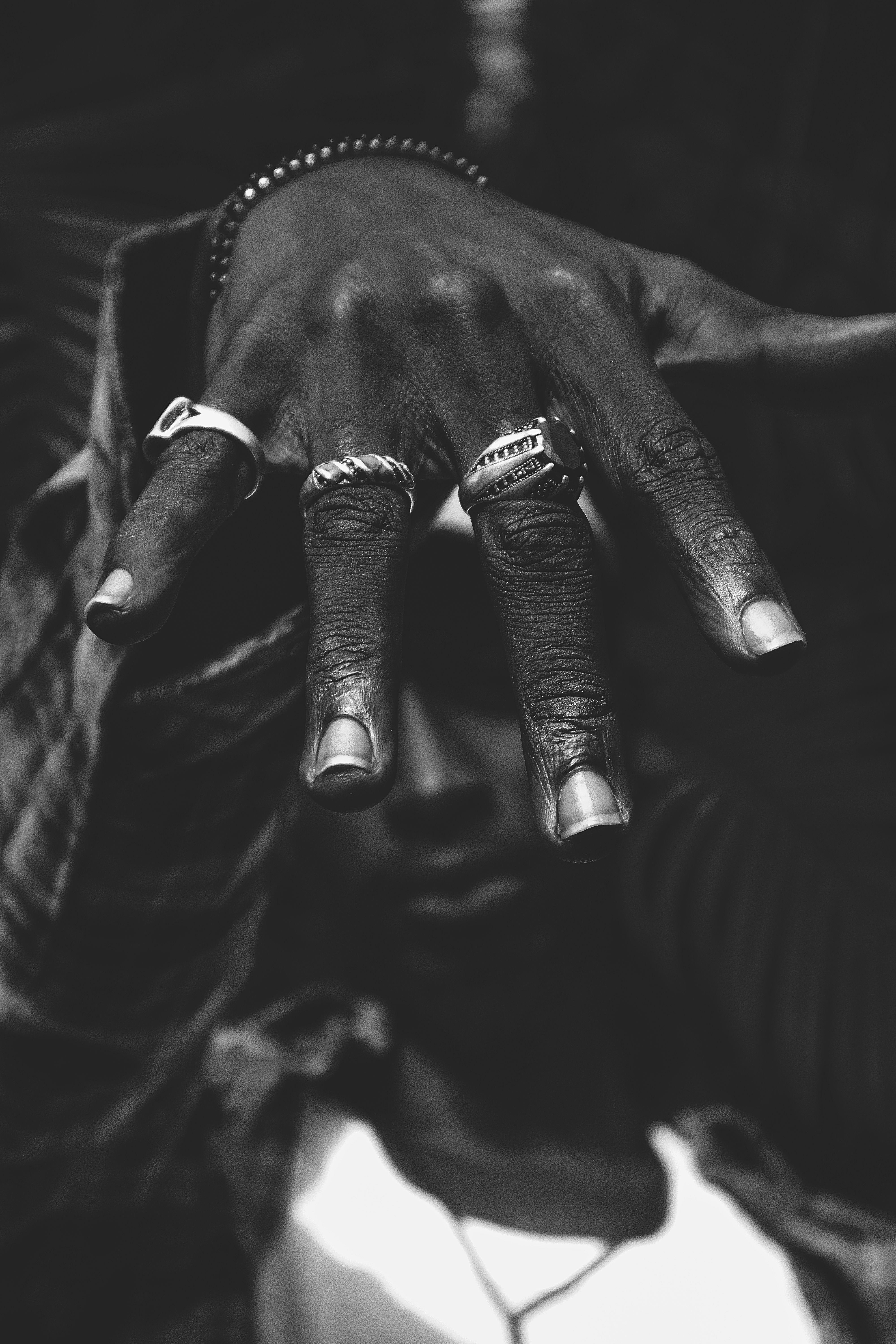 Black and White Close-Up of Hand with Rings · Free Stock Photo