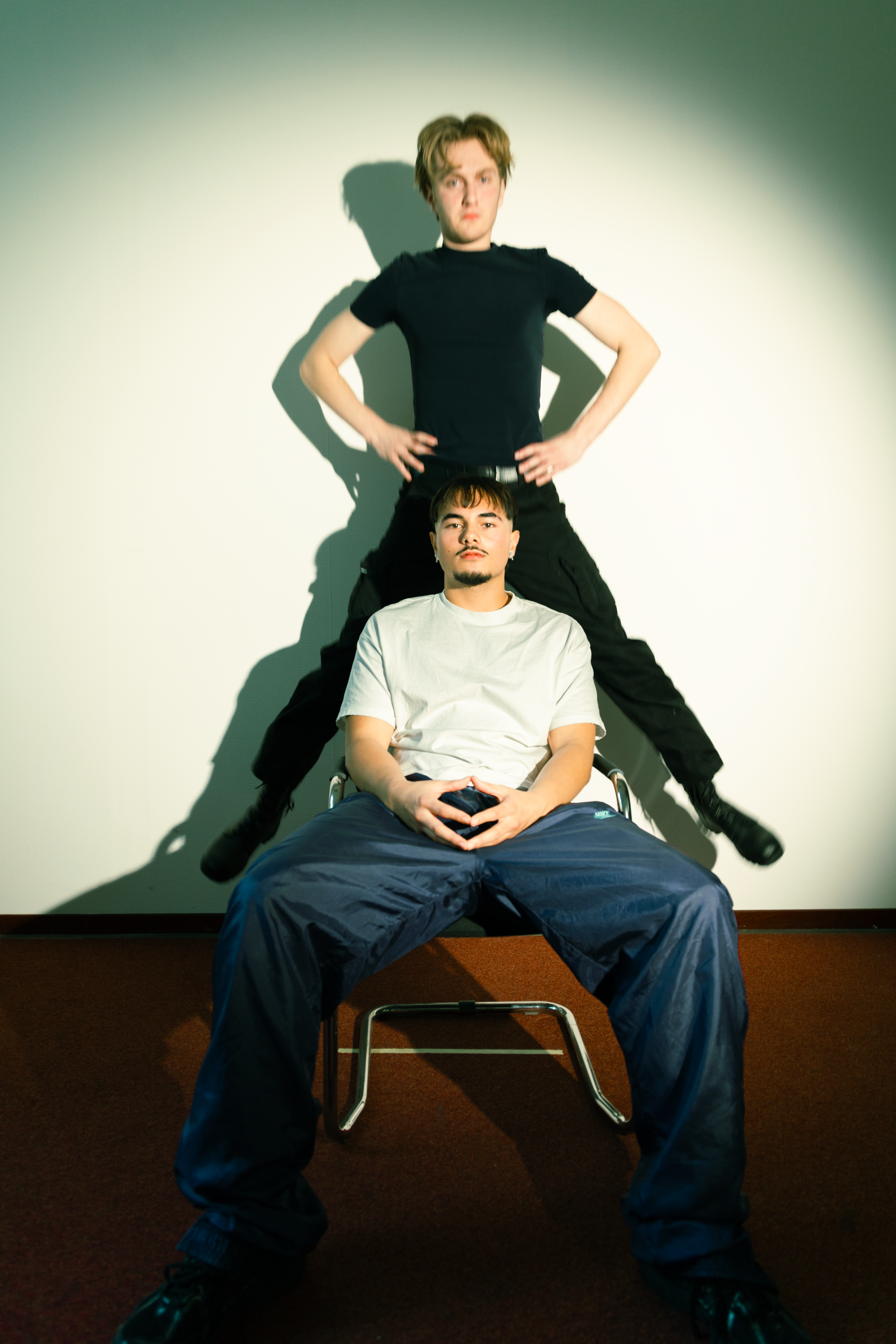 Dynamic Portrait of Two Men in Creative Pose · Free Stock Photo