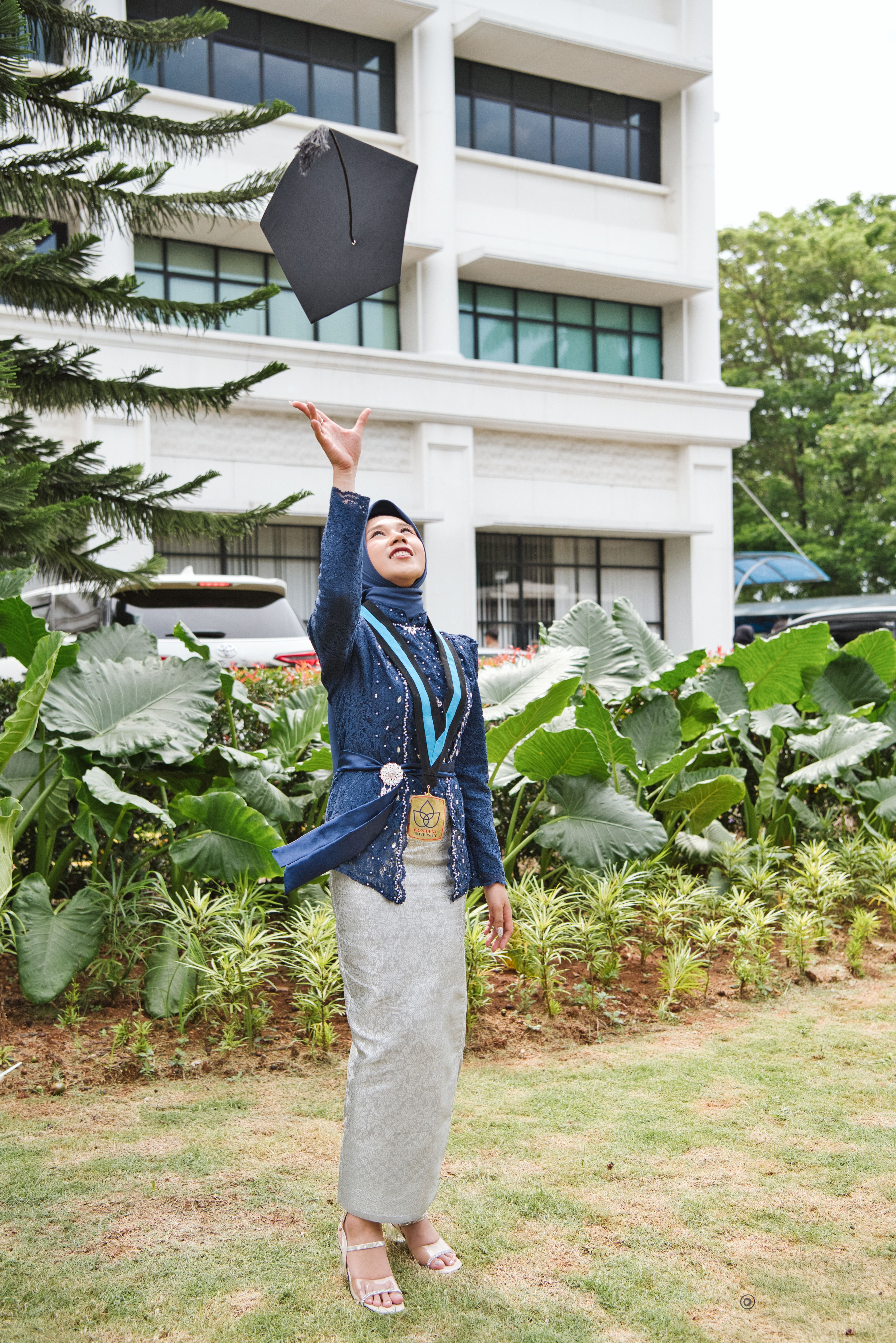 Graduation Celebration in Urban Garden Setting · Free Stock Photo