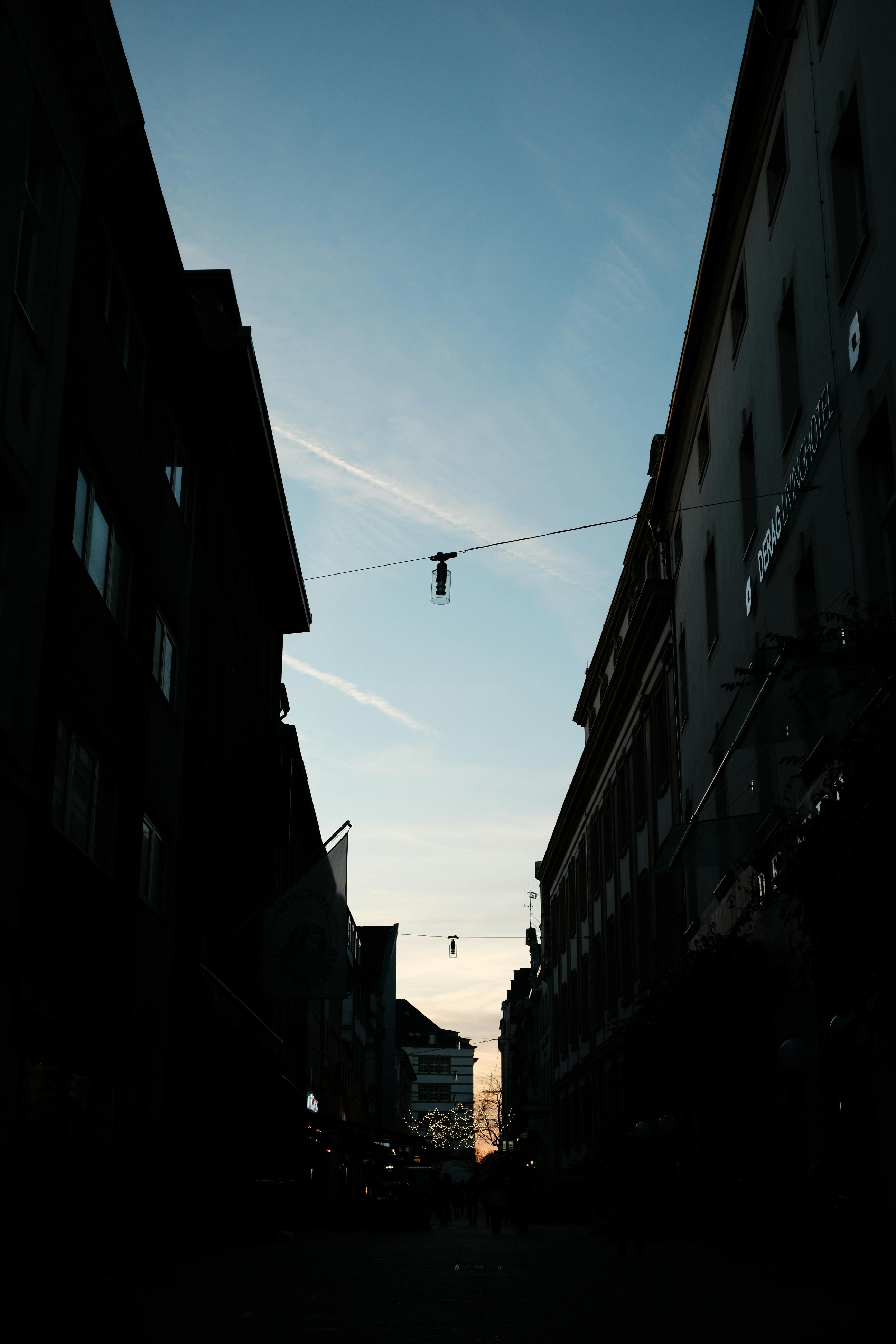 silhouette of urban street scene at dusk