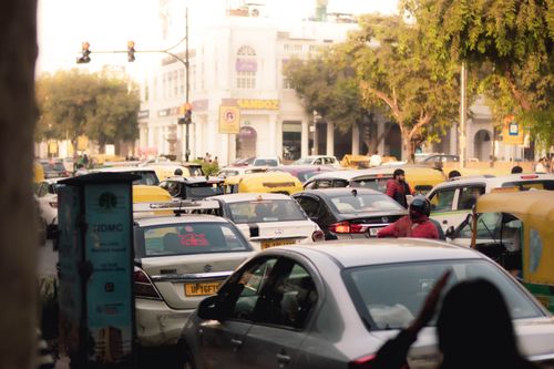 Free Busy street scene with congested traffic in New Delhi, India. Captured in vibrant daylight showcasing city hustle. Stock Photo