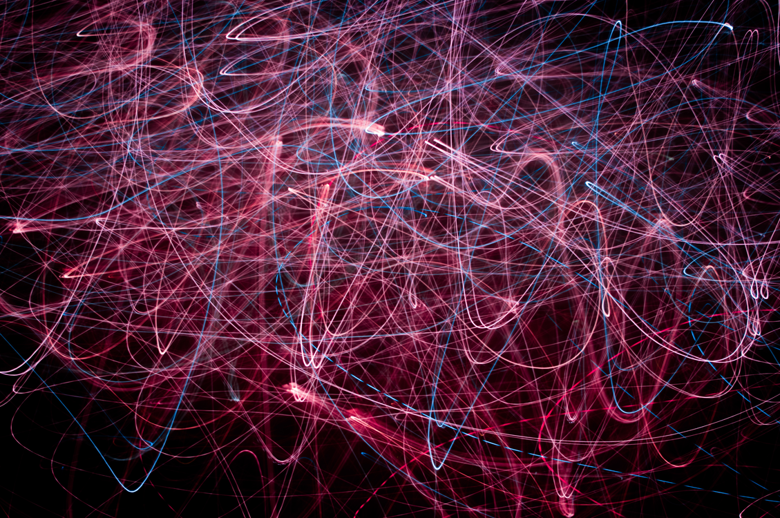 Dynamic Abstract Light Trails on Black Background · Free Stock Photo