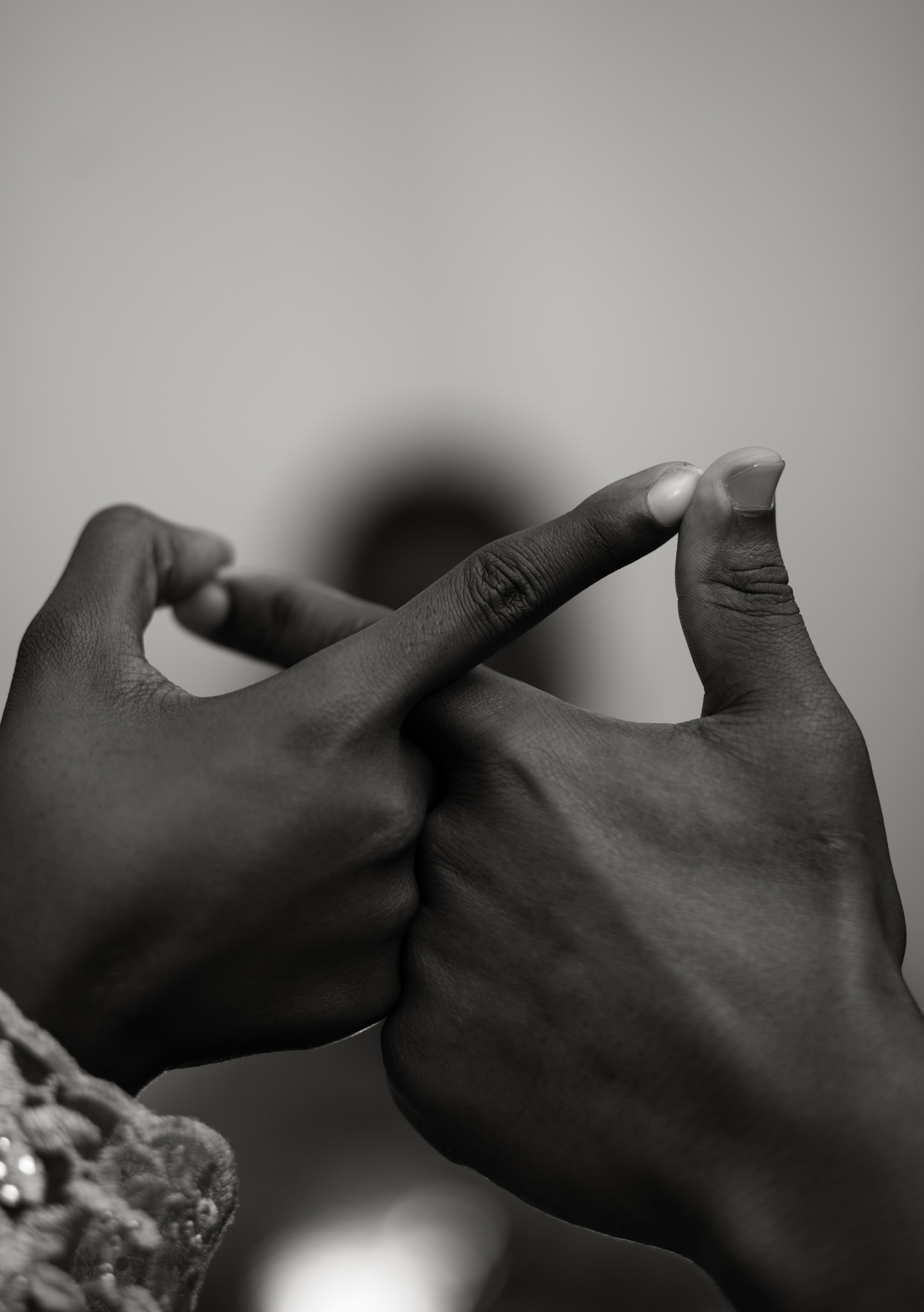 Black and White Artistic Hand Gesture Close-Up · Free Stock Photo