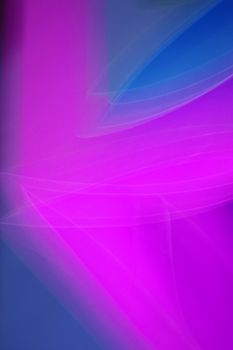Captivating abstract image of dynamic pink and blue light trails creating a modern art effect.