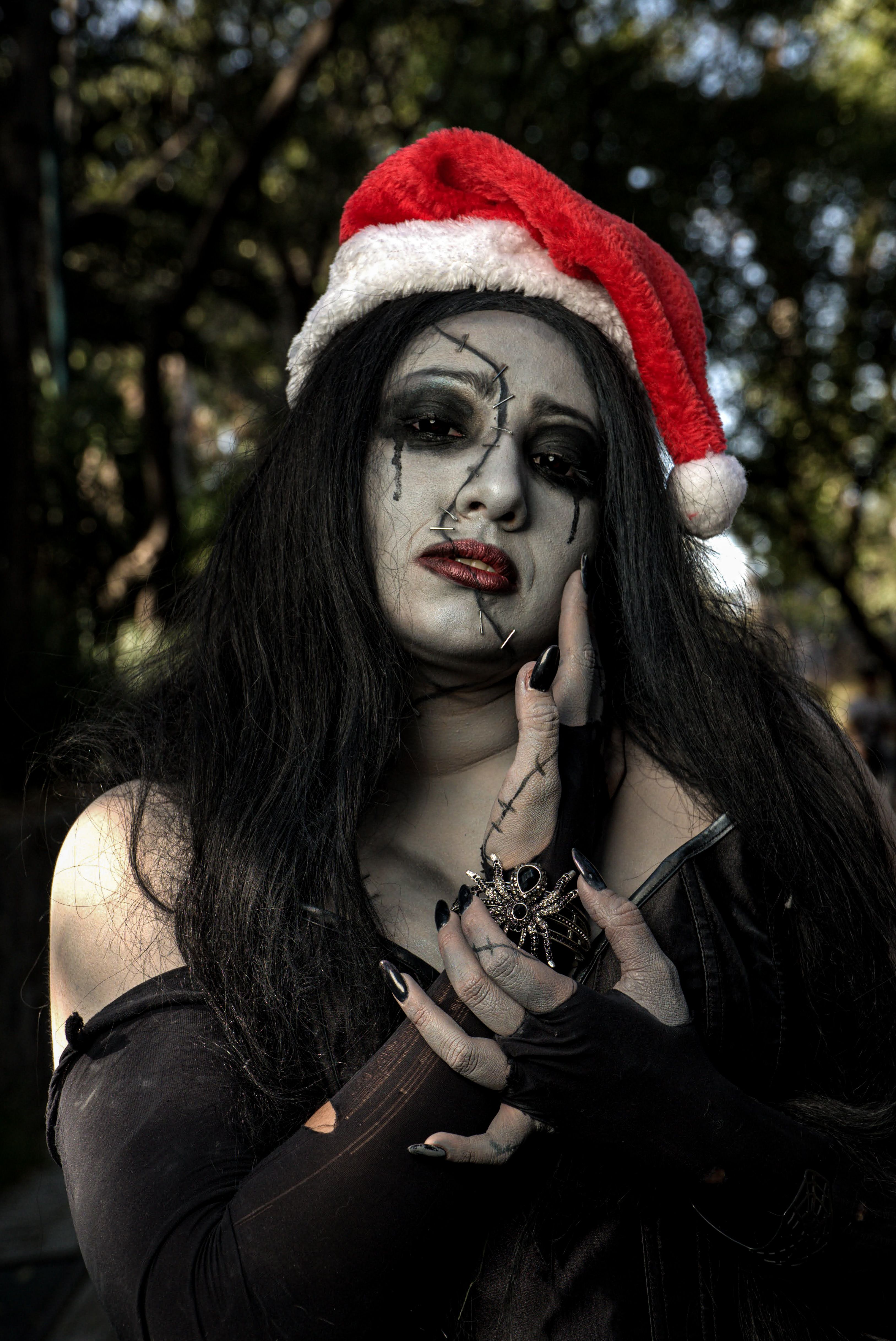 gothic-cosplay-with-christmas-hat-outdoors-free-stock-photo
