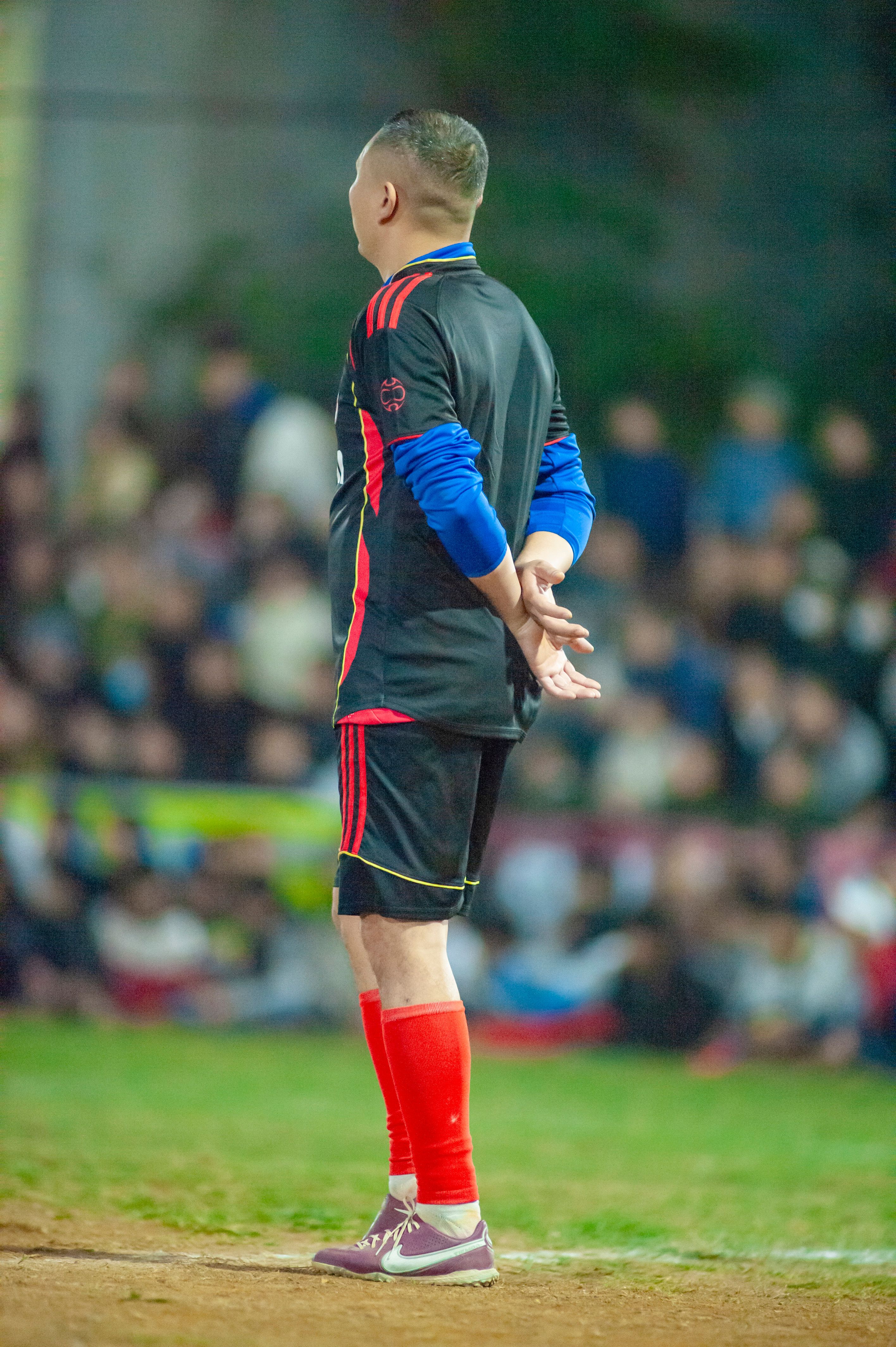 Soccer Coach Observing Match on Field · Free Stock Photo