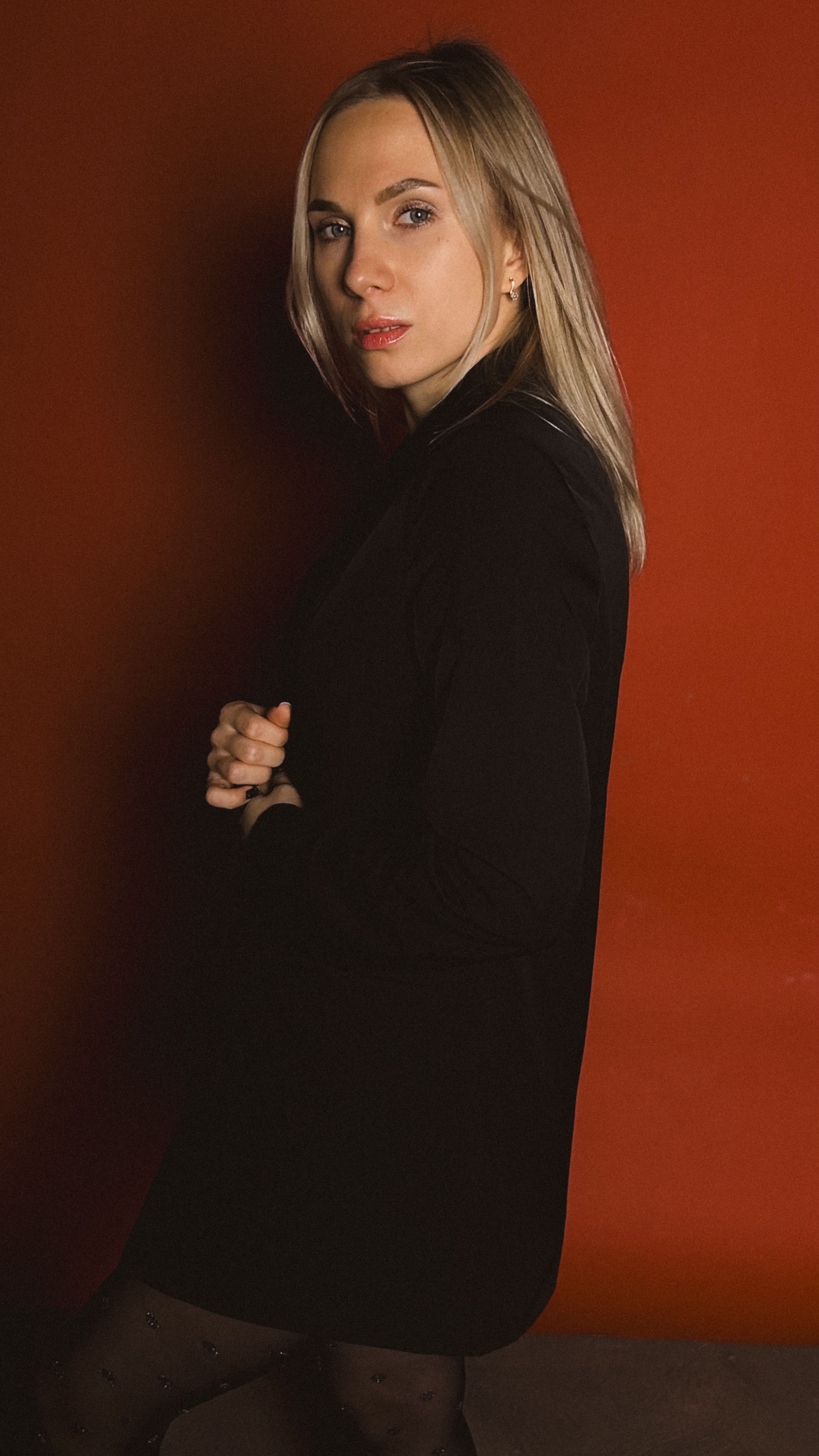 Elegant Portrait of Woman with Red Background · Free Stock Photo