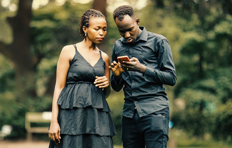 diverse group of people connecting through online dating platforms