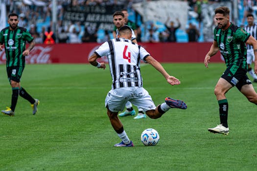 Action-packed soccer game with players competing energetically on the field.