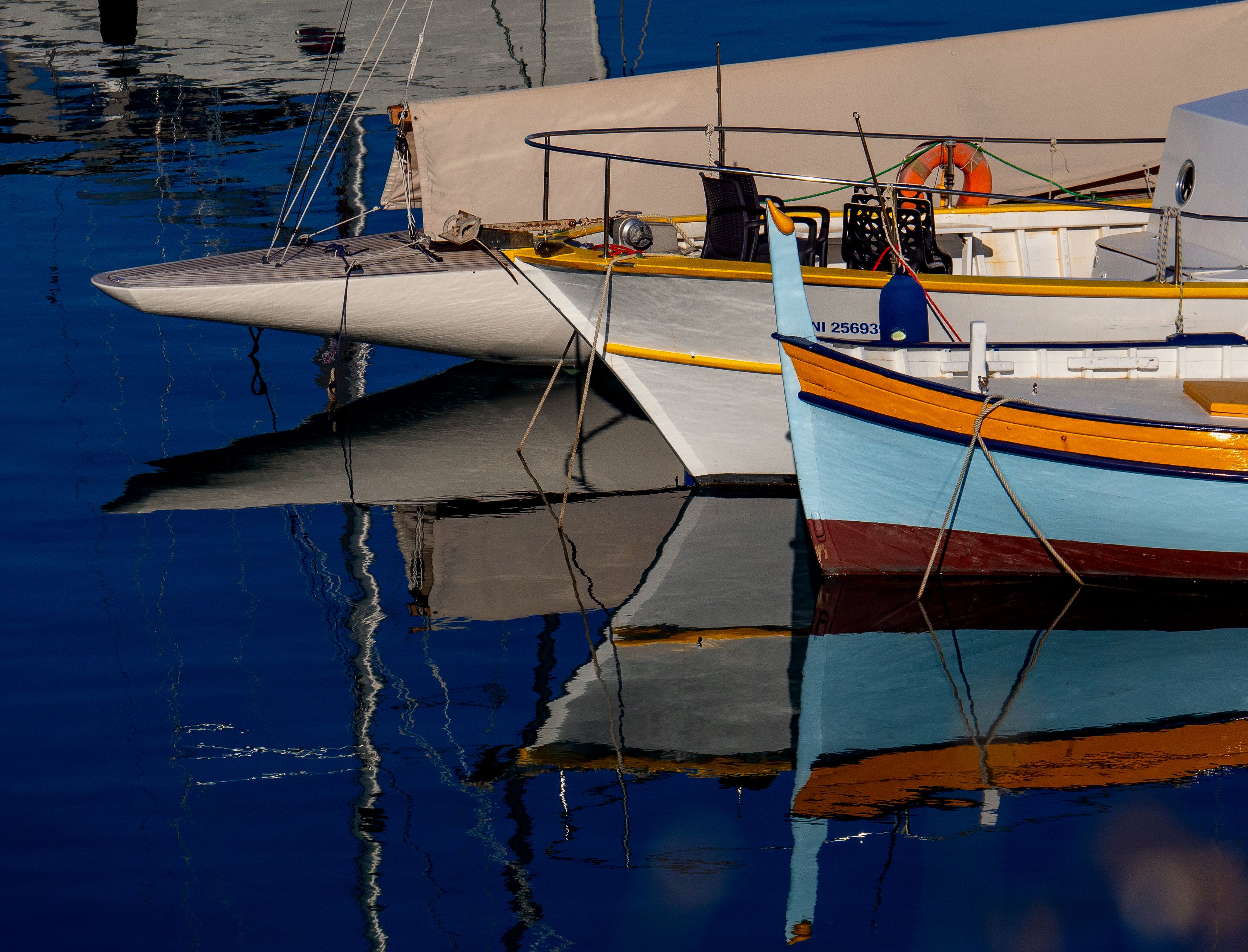 Colorful Boats Reflected in Antibes Harbor · Free Stock Photo