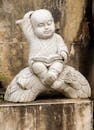 Charming Stone Buddha Statue in Thoughtful Pose