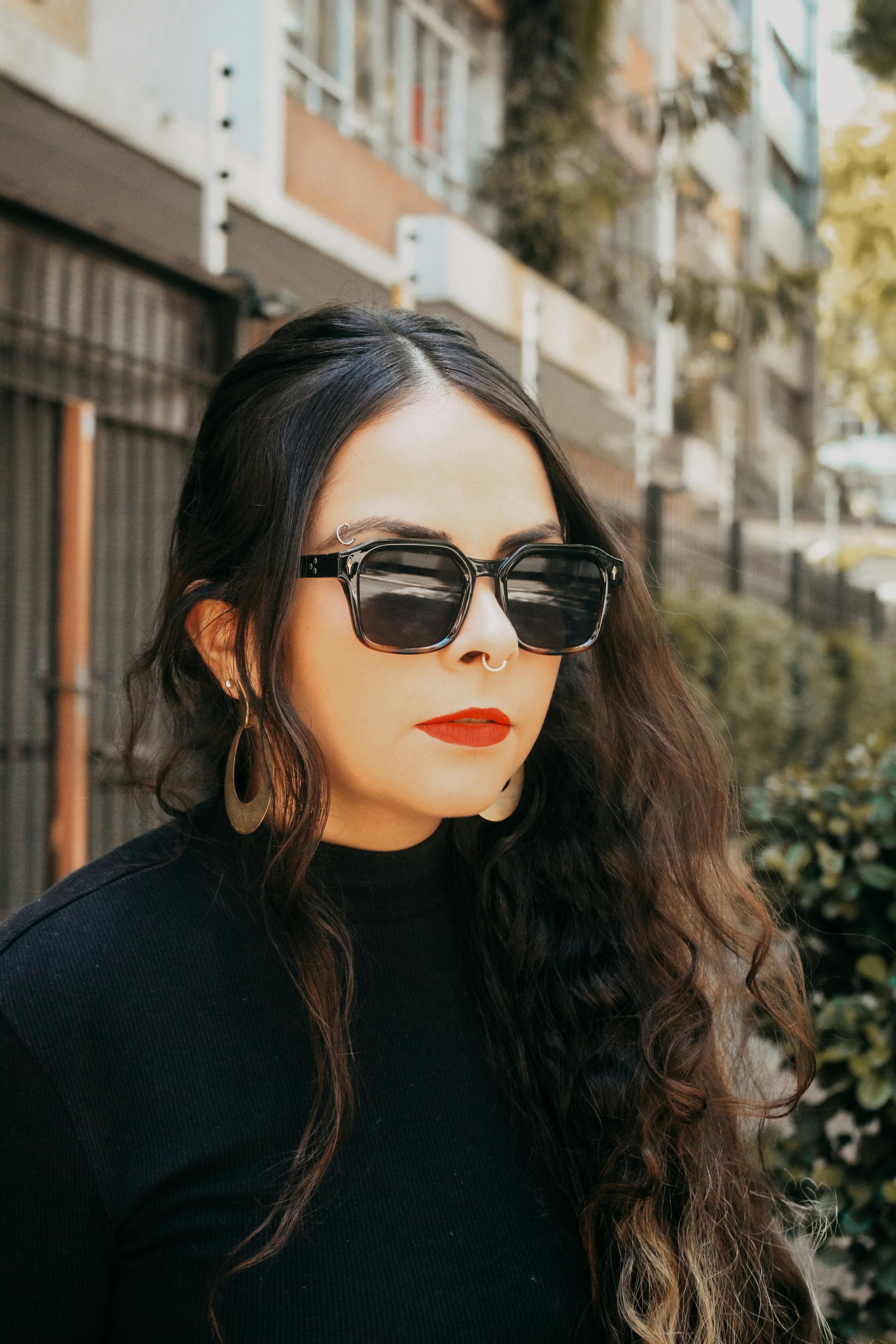 stylish woman in sunglasses outdoors