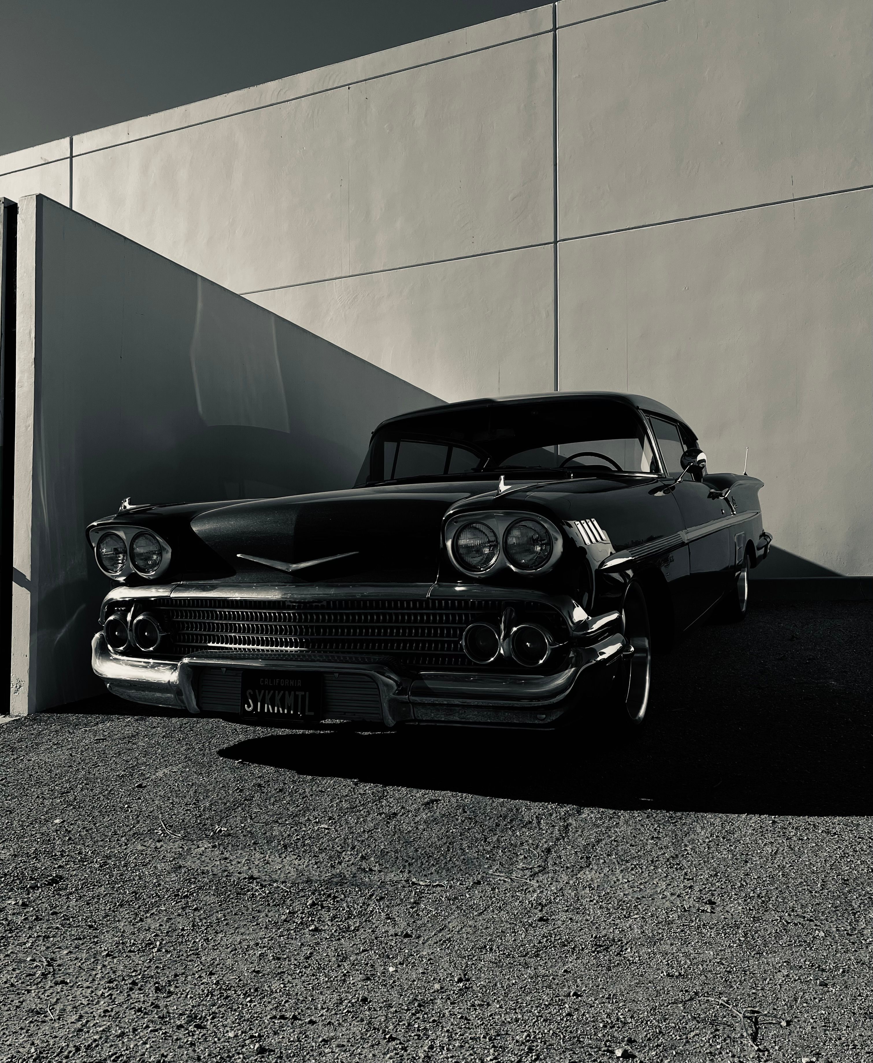 Vintage Classic Car in Shadowed Setting · Free Stock Photo