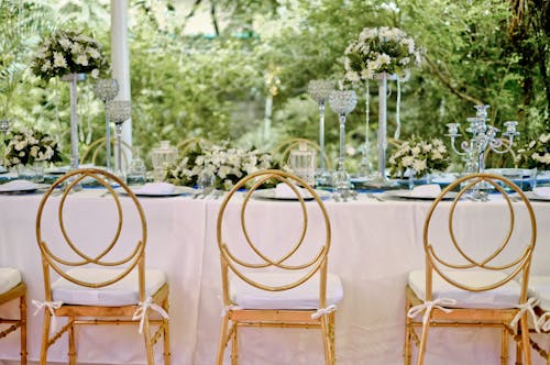 Free Three Yellow Padded Chairs Beside Table Stock Photo