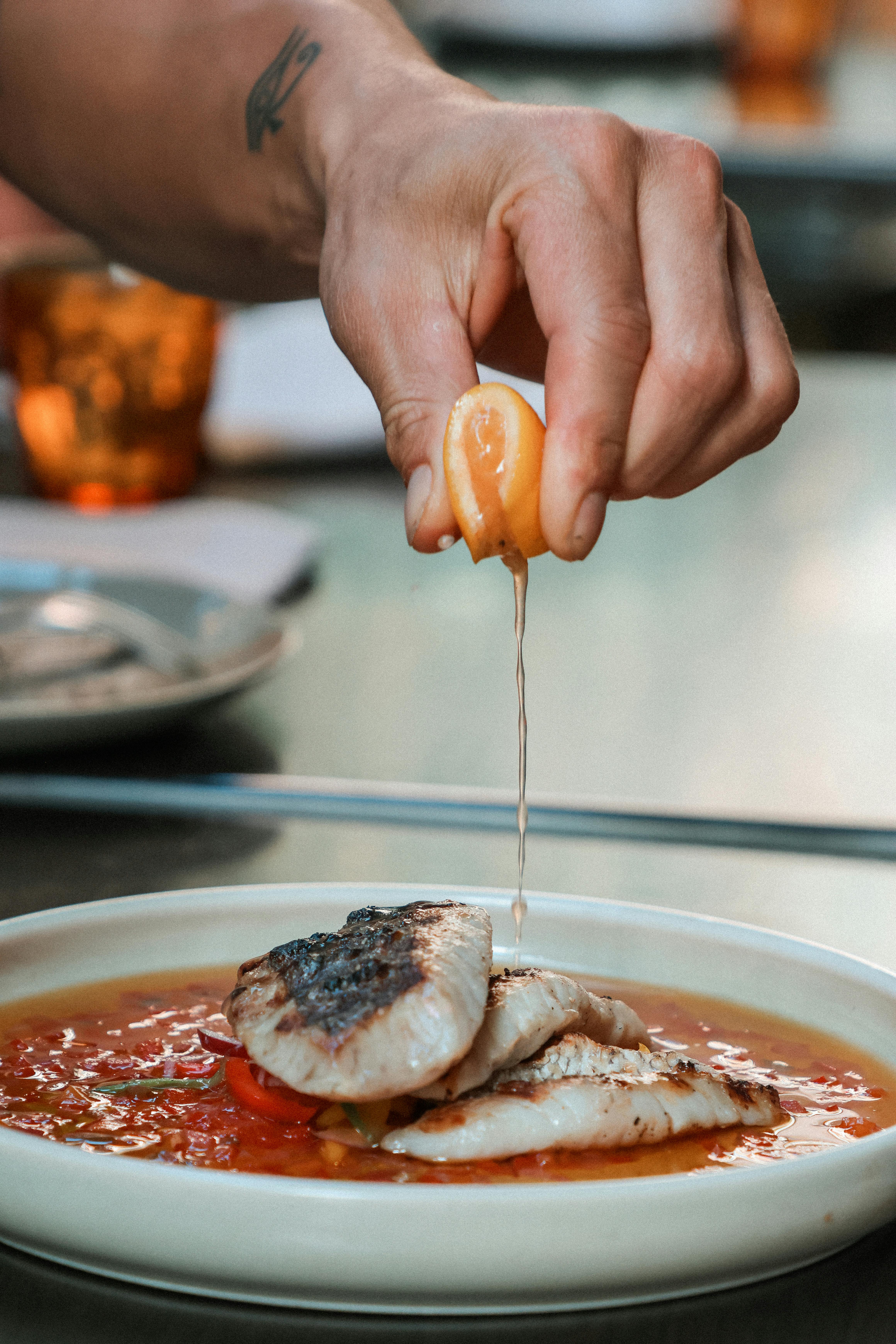 freshly prepared fish with lemon drizzle