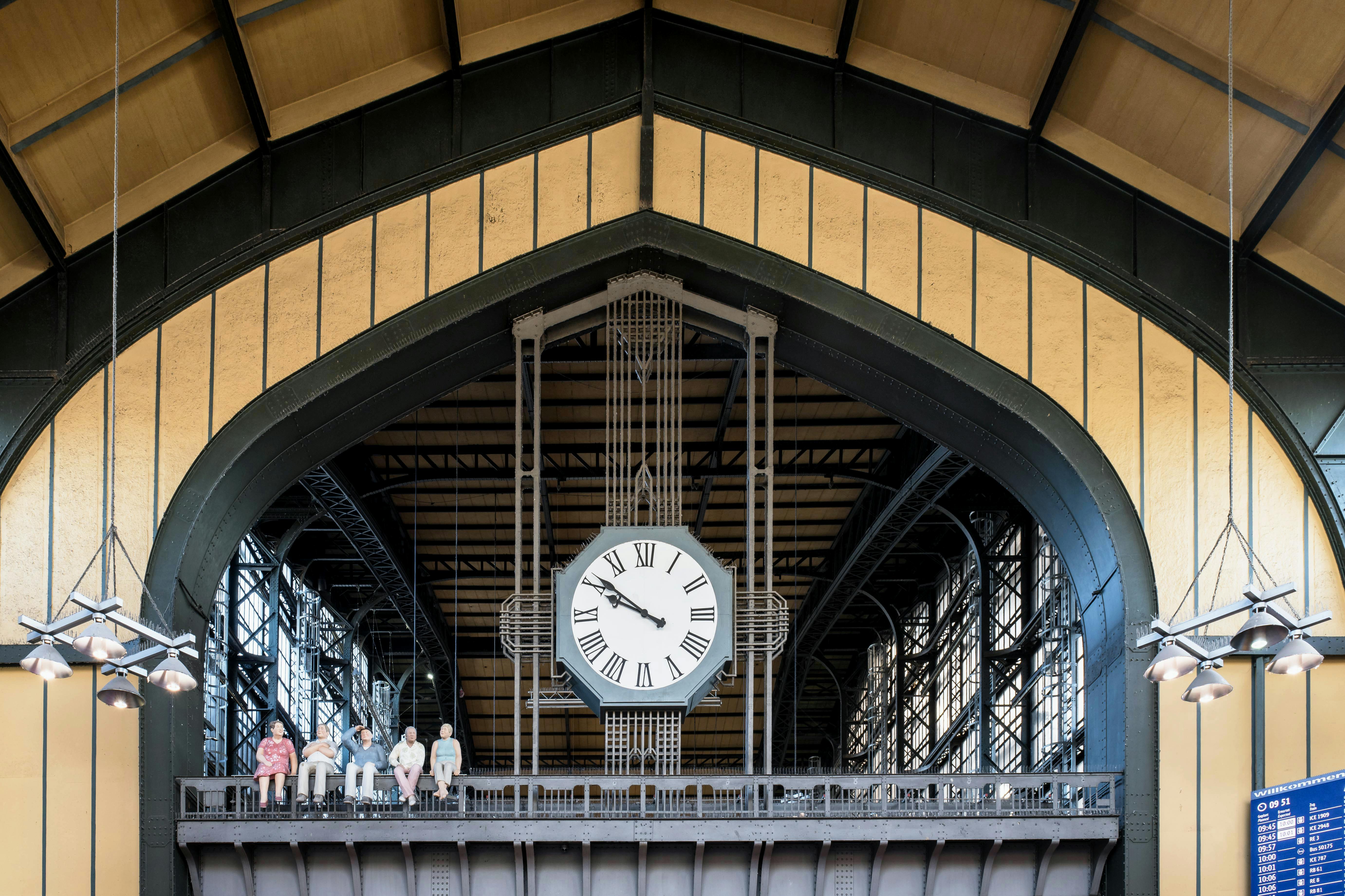 decorative clock inside hamburg train station