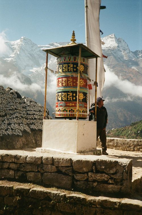 Free Buddhist prayer stupa in Namche, Nepal with stunning Himalayan backdrop. A serene spiritual and cultural scene. Stock Photo