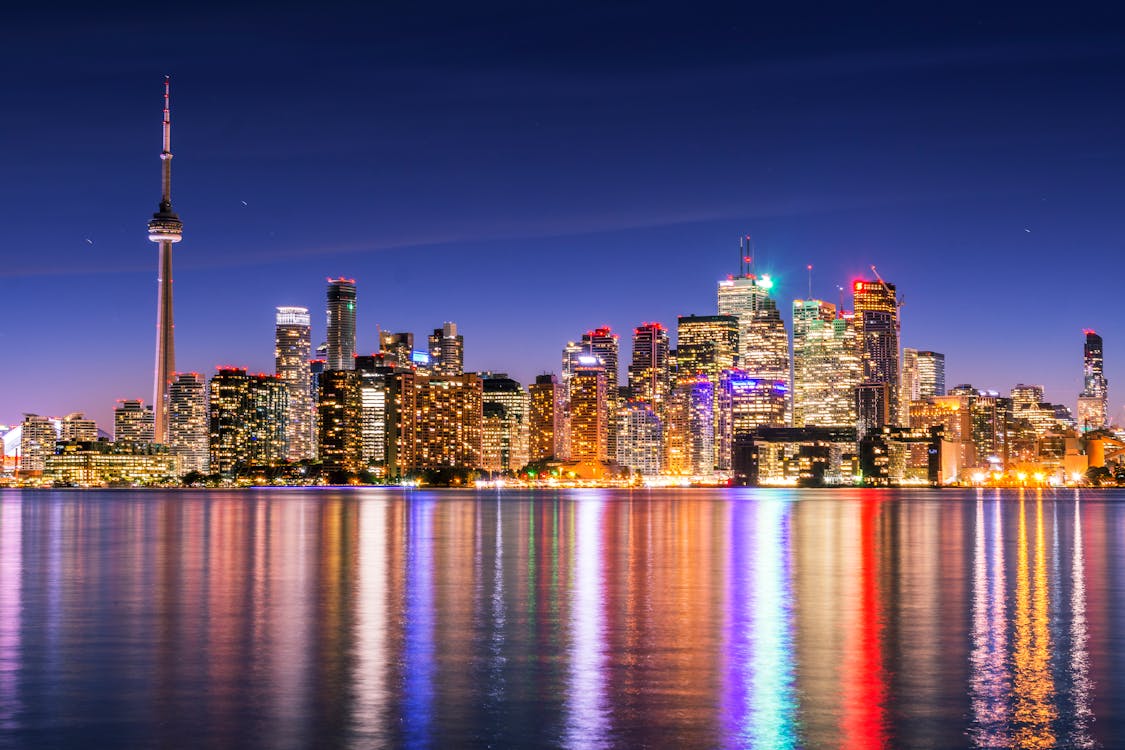 Free Skyline Photography of Buildings during Nighttime Stock Photo