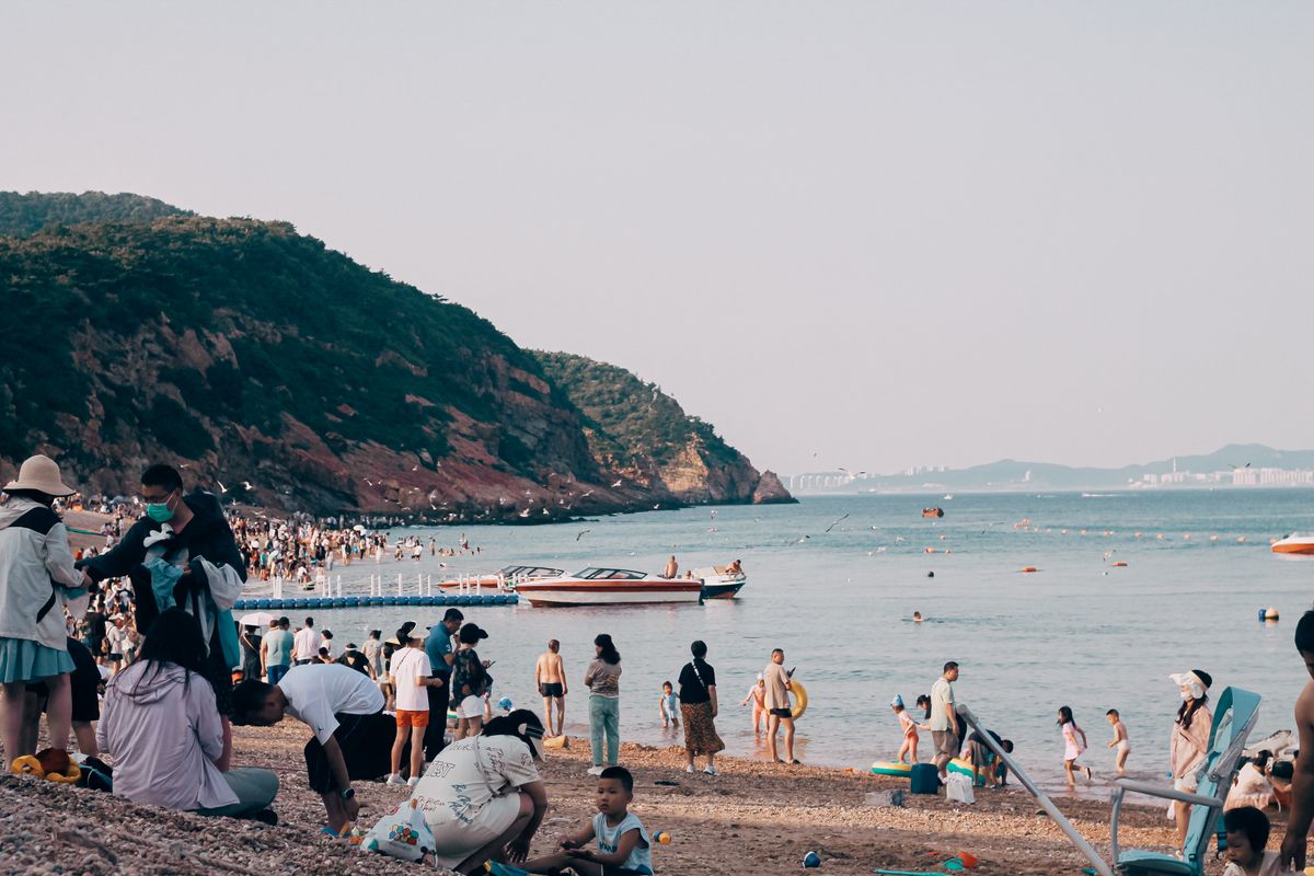 Busy family beach during peak holiday season