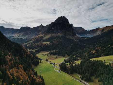 Majestic aerial view of a mountain landscape in autumn, Glarus, Switzerland.