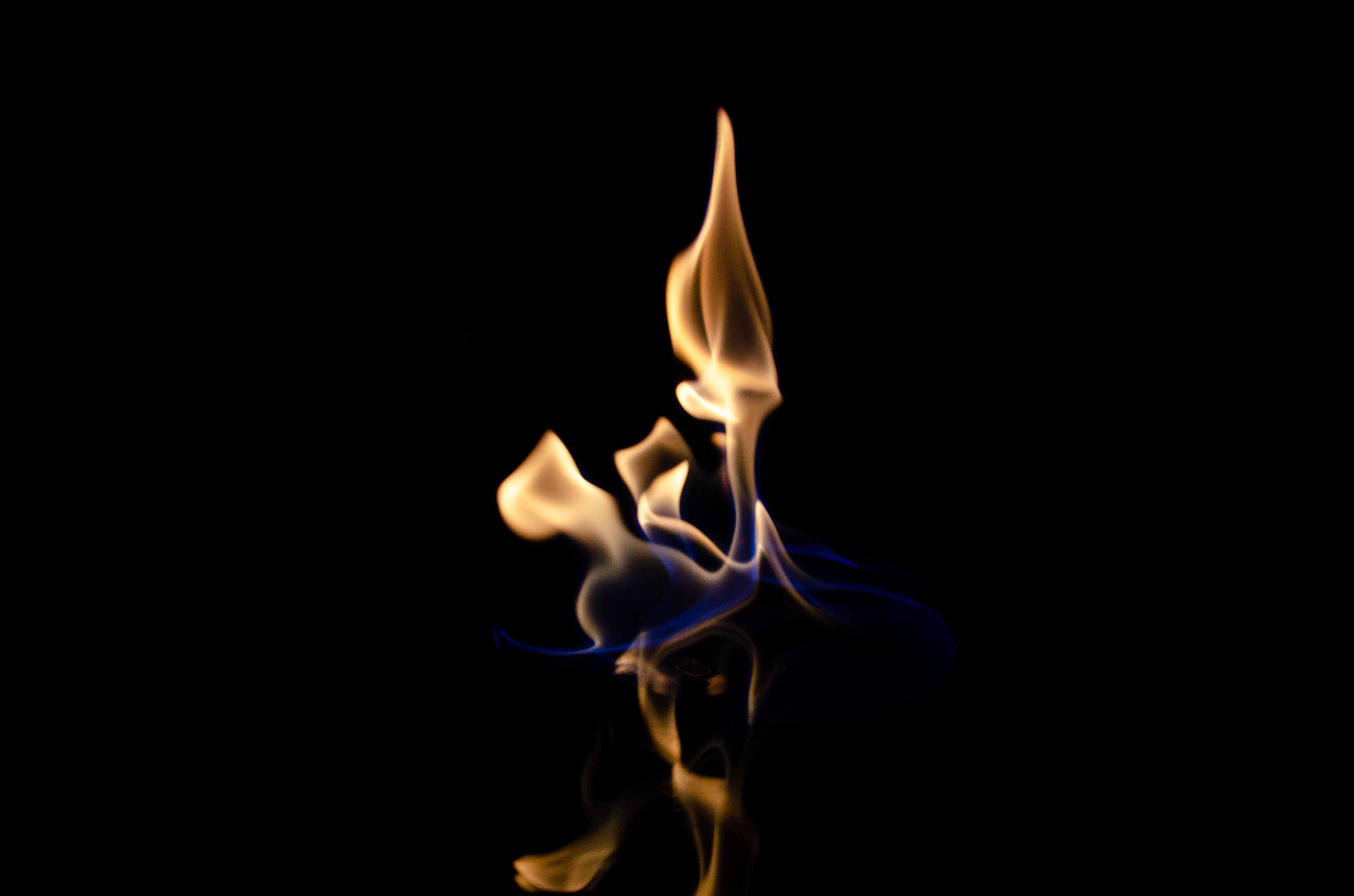 Abstract Blue and Orange Dancing Flame on Black · Free Stock Photo