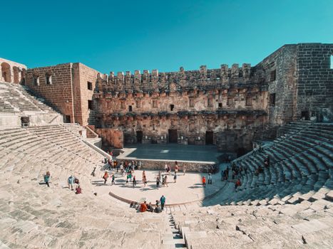 Aspendos Roman theatre with historian — Antalya