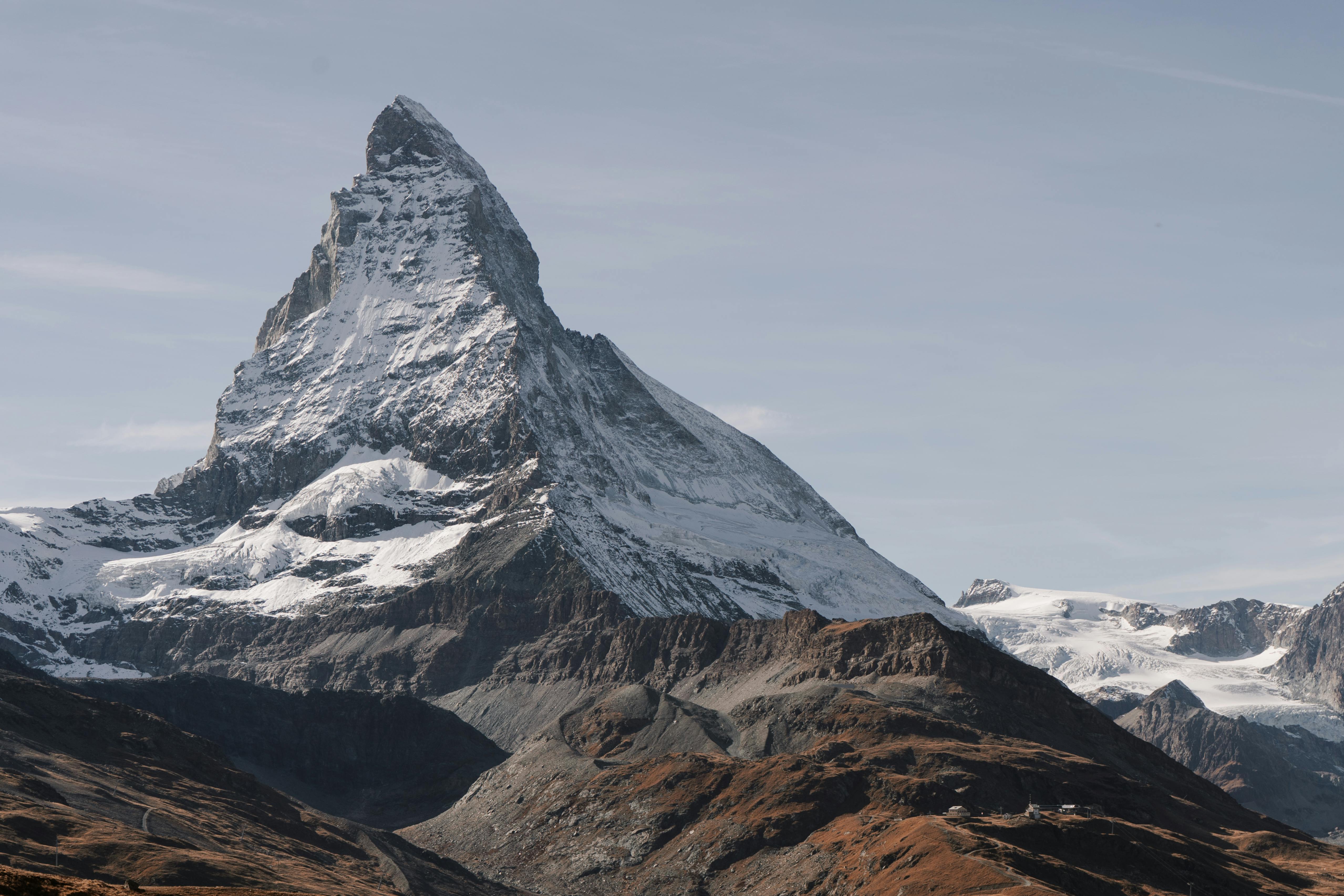 Majestic Matterhorn mountain peak in Zermatt, Switzerland, under a clear blue sky.
