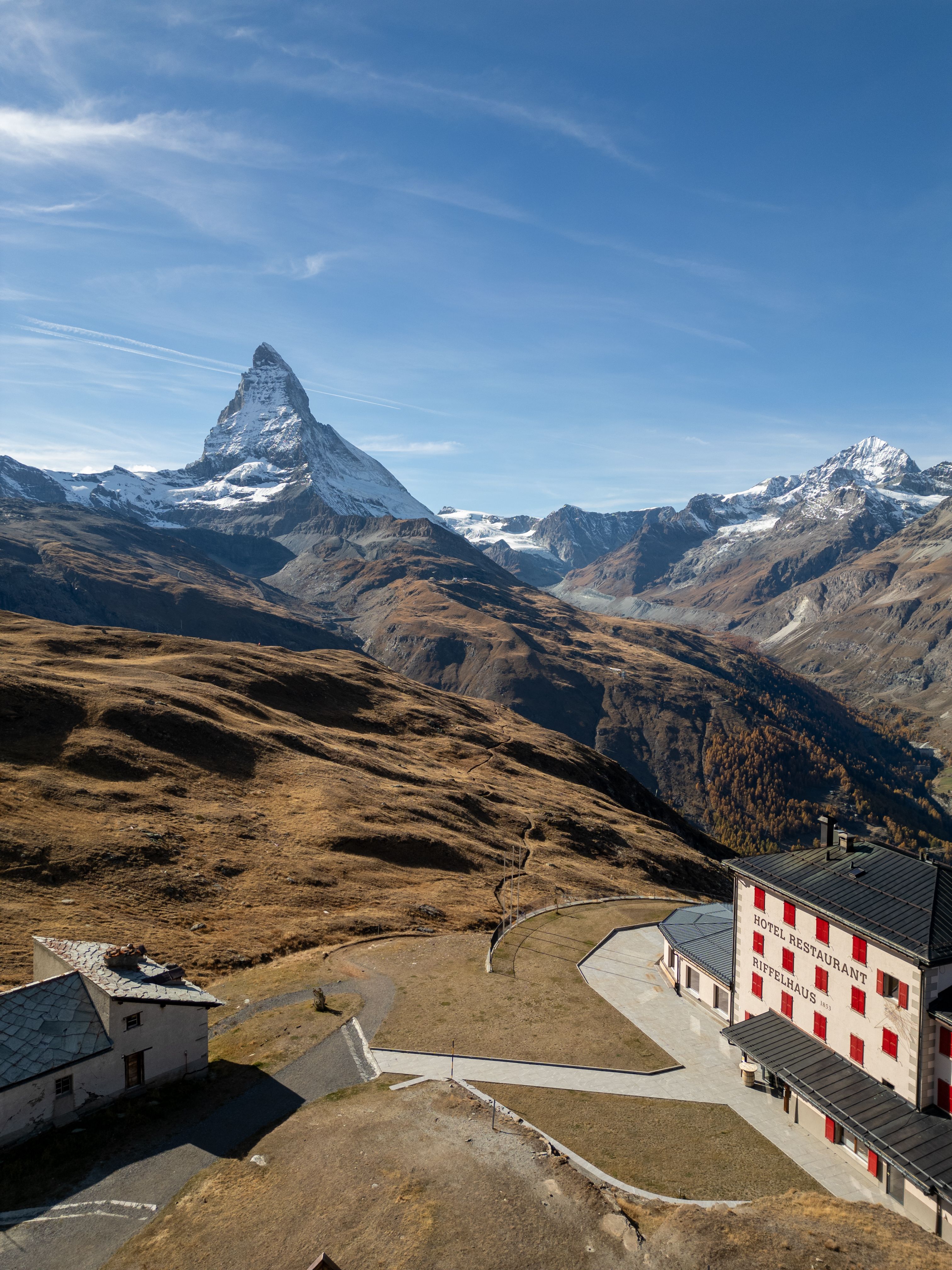 Stunning view of the Matterhorn mountain from Zermatt, Switzerland, under a clear blue sky.