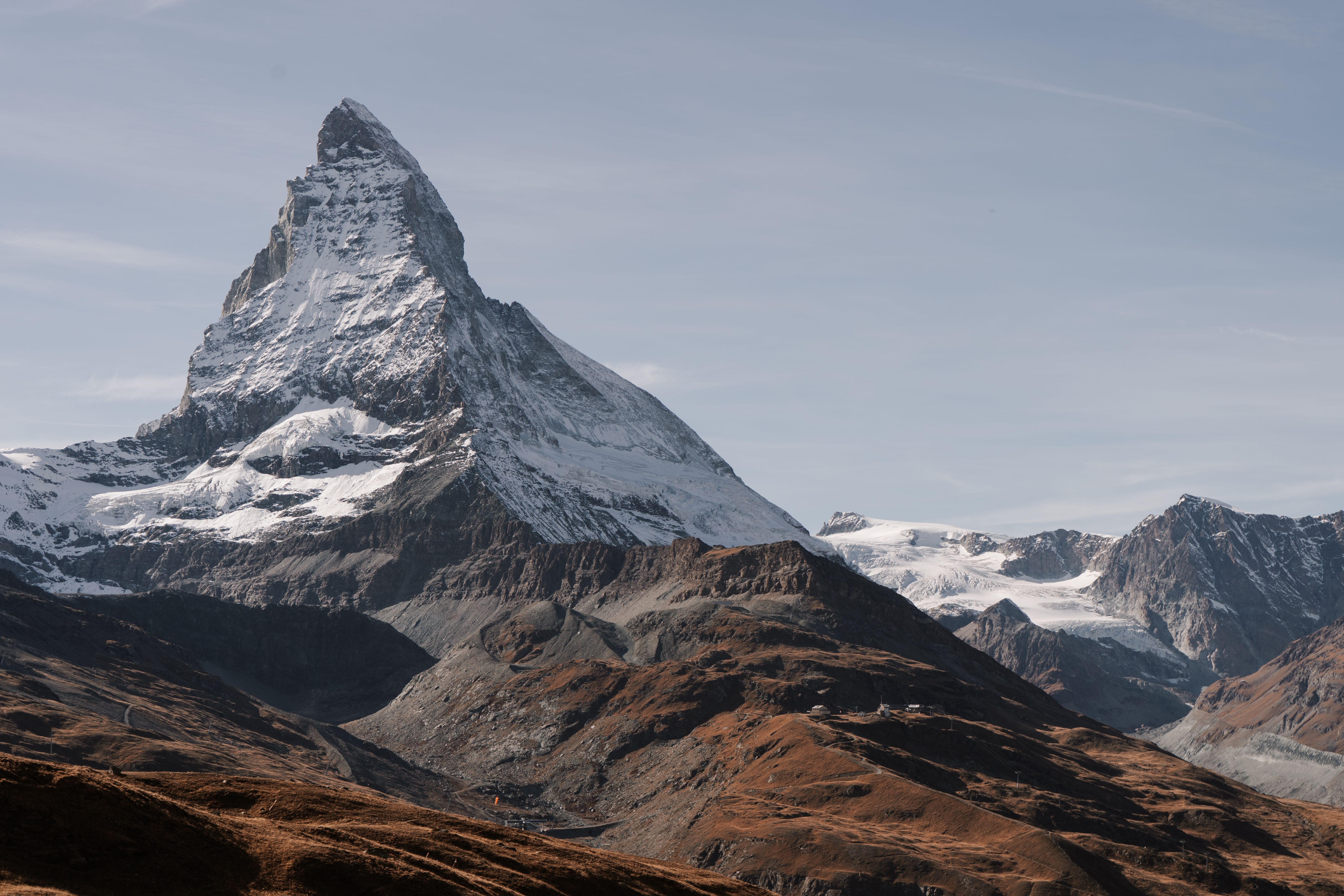 Stunning View Of The Iconic Matterhorn Mountain In Zermatt, Switzerland, Captured During A Clear Day.