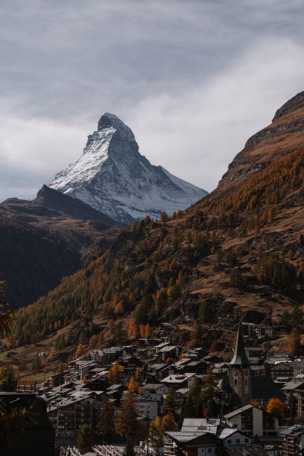 Breathtaking autumn view of Matterhorn mountain towering over the village of Zermatt, Switzerland.