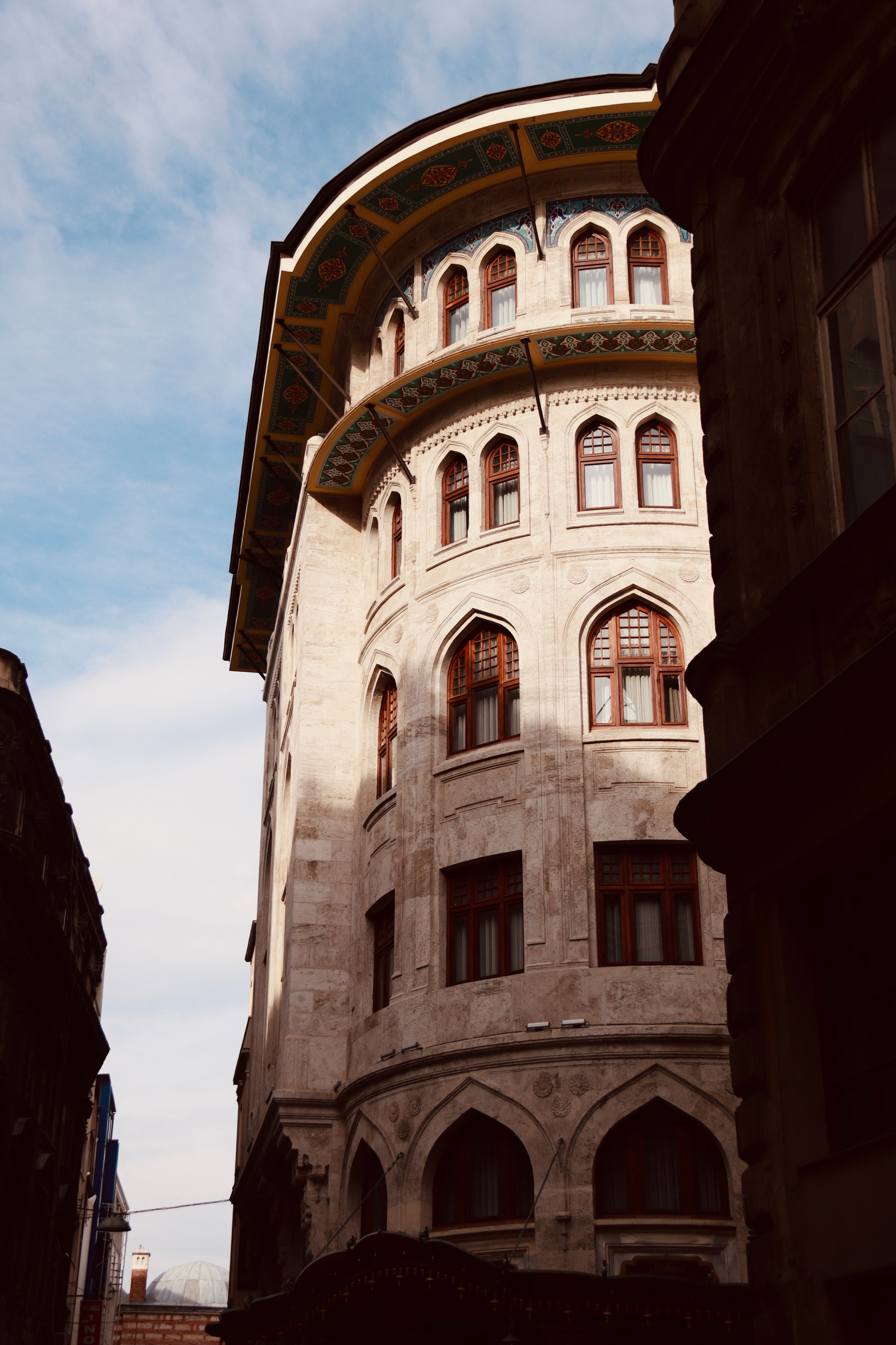 Elegant Historical Building with Arched Windows · Free Stock Photo