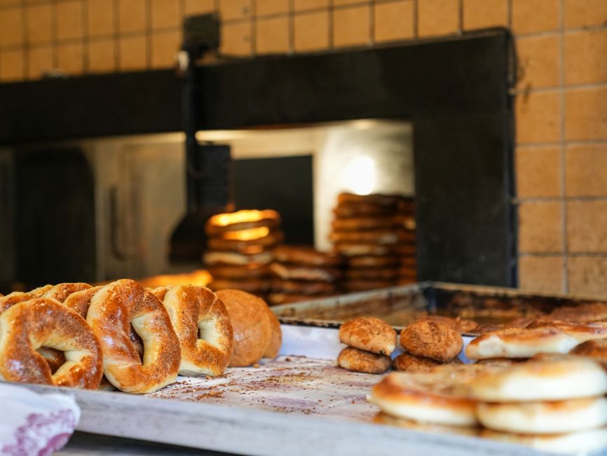 Delicious simit and bread freshly baked in a traditional Bursa bakery. Capturing the essence of Turkish cuisine.