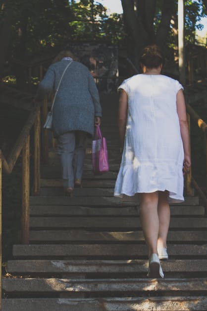 Free stock photo of summer time, walking up stairs, women in white dress walking up stairs