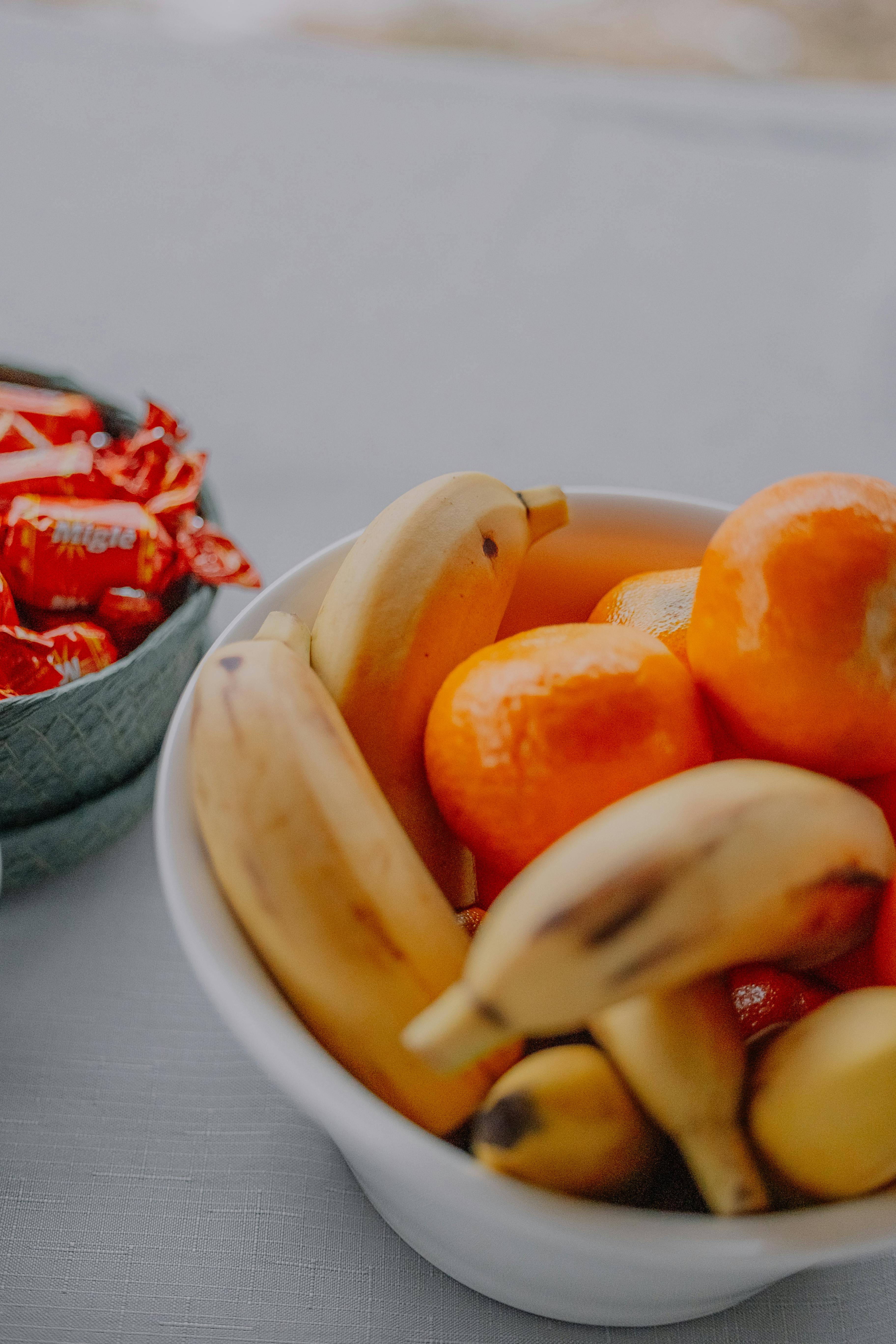 fresh fruit and sweets on a simple table