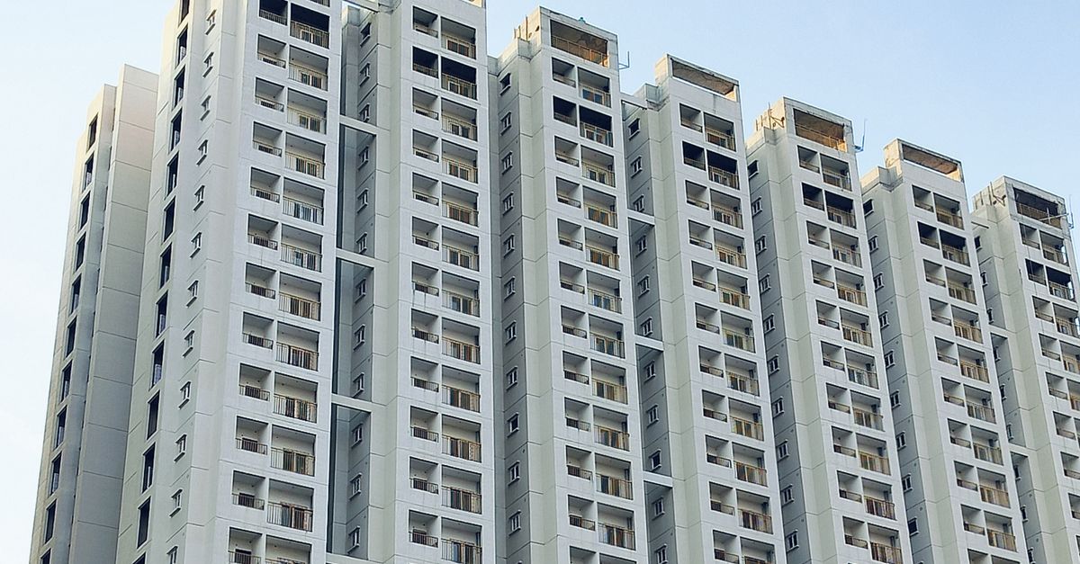 High Rise Building Dormitory Modern High-Rise Building Under Clear Blue Sky · Free Stock Photo