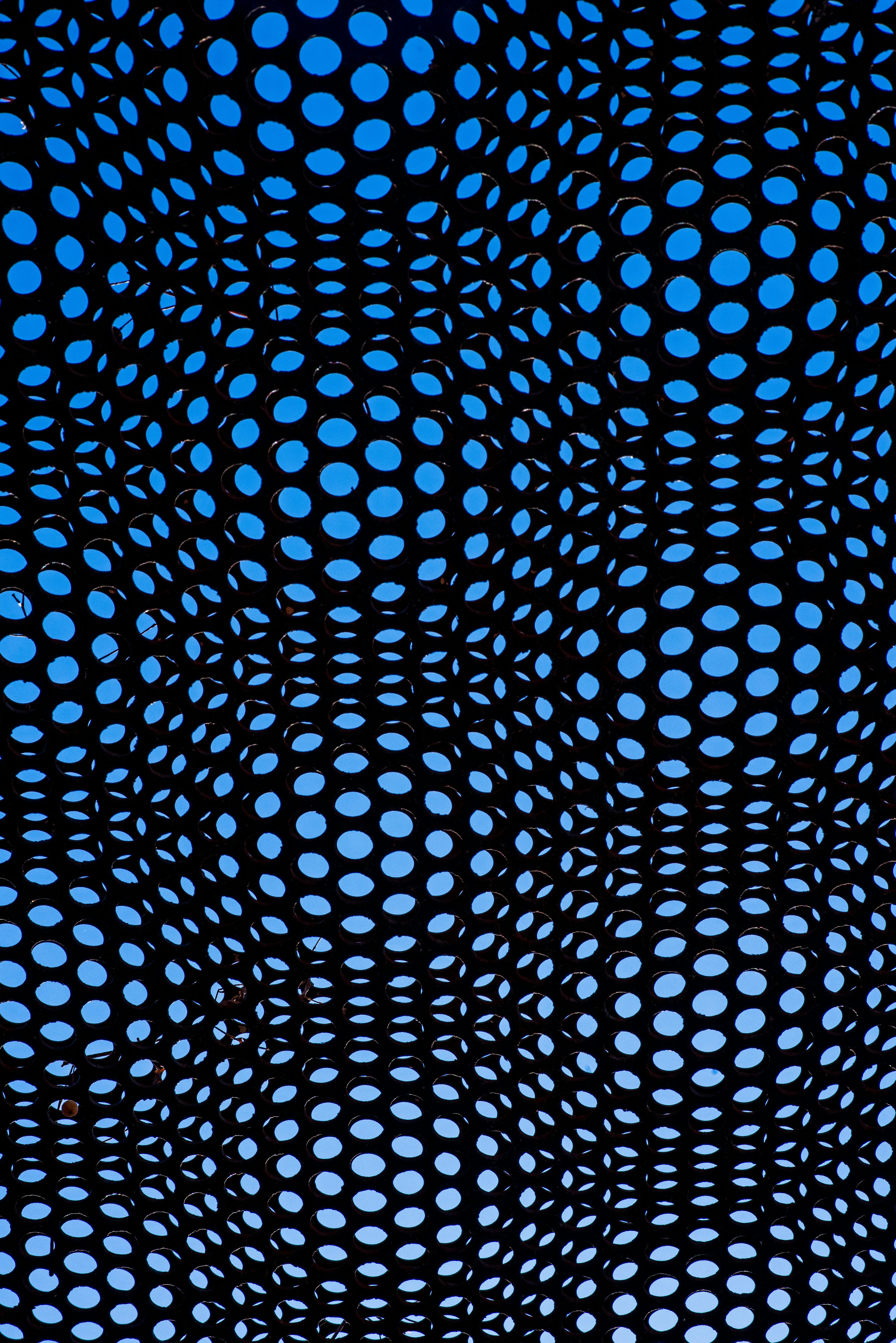 Безкоштовне Художній візерунок кіл, що перекриваються, створює захоплюючий абстрактний візуальний ефект. стокове фото