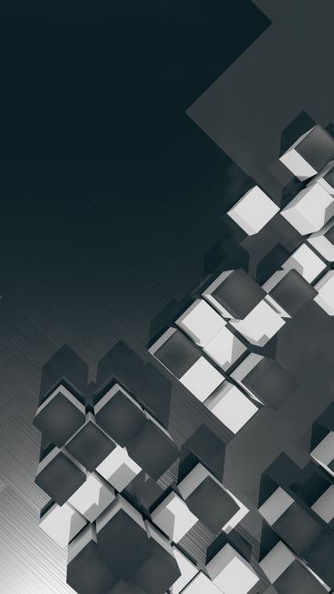 Minimalist 3D render of abstract geometric cubes in grayscale tones.
