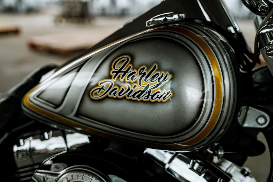 Detailed photo of a Harley Davidson motorcycle tank with intricate design.