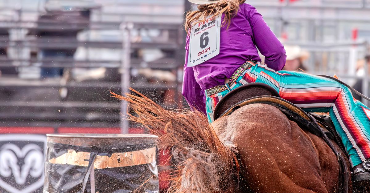 Barrel Racing Events Dynamic Barrel Racing at a Rodeo Event · Free Stock Photo