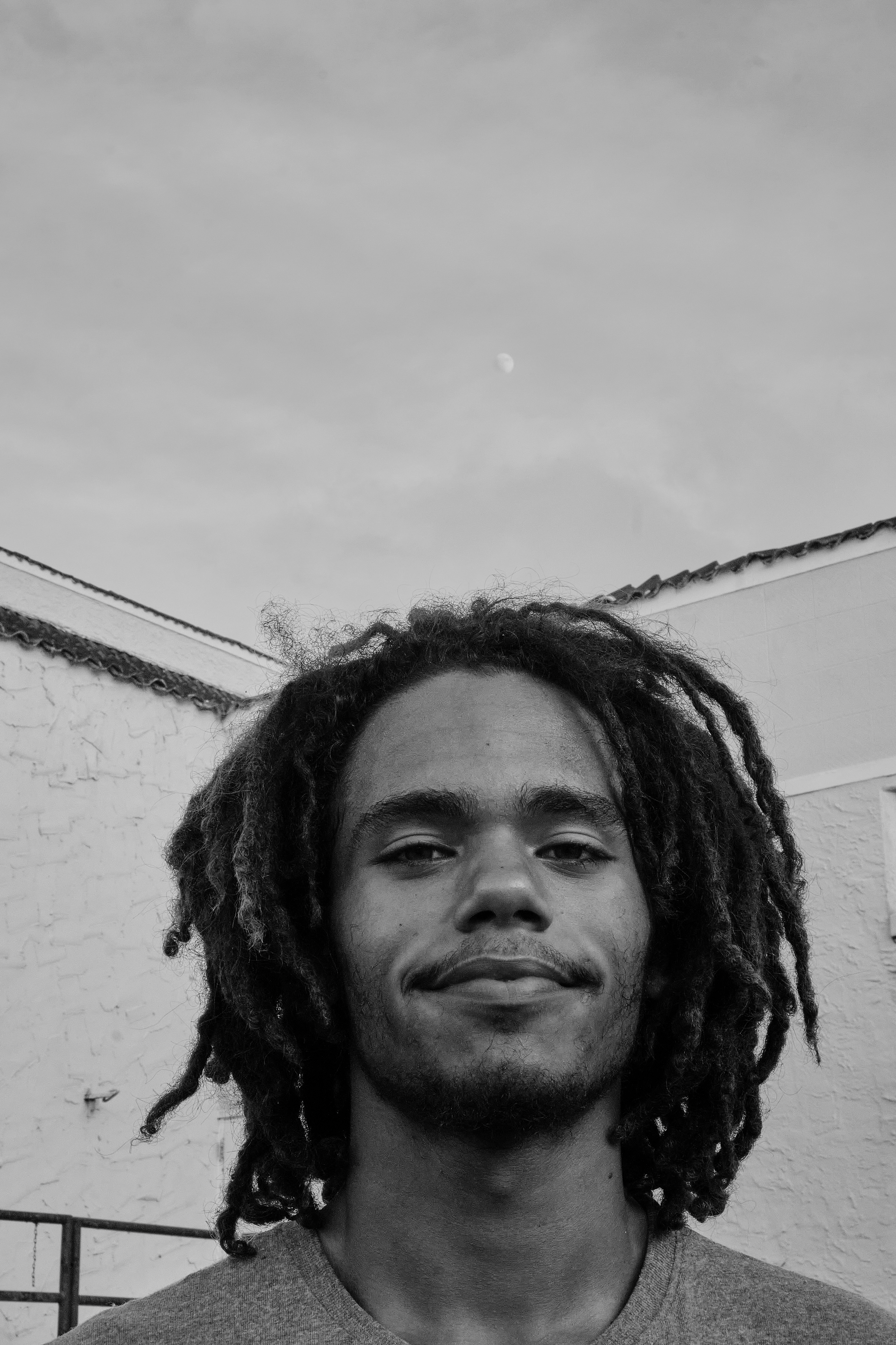 Portrait of a Man with Dreadlocks Outdoors · Free Stock Photo