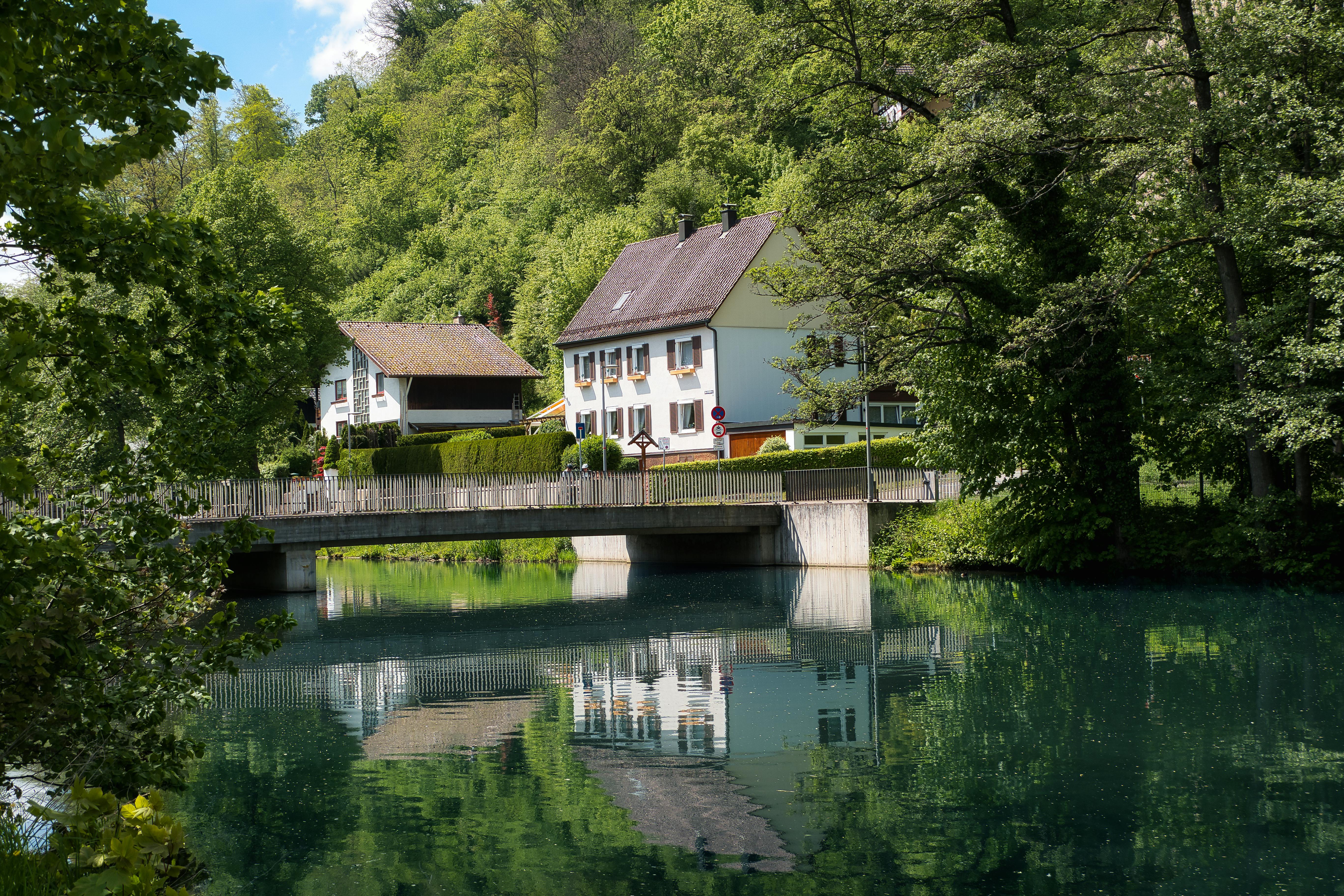 picturesque bridge and houses reflected in nagold river