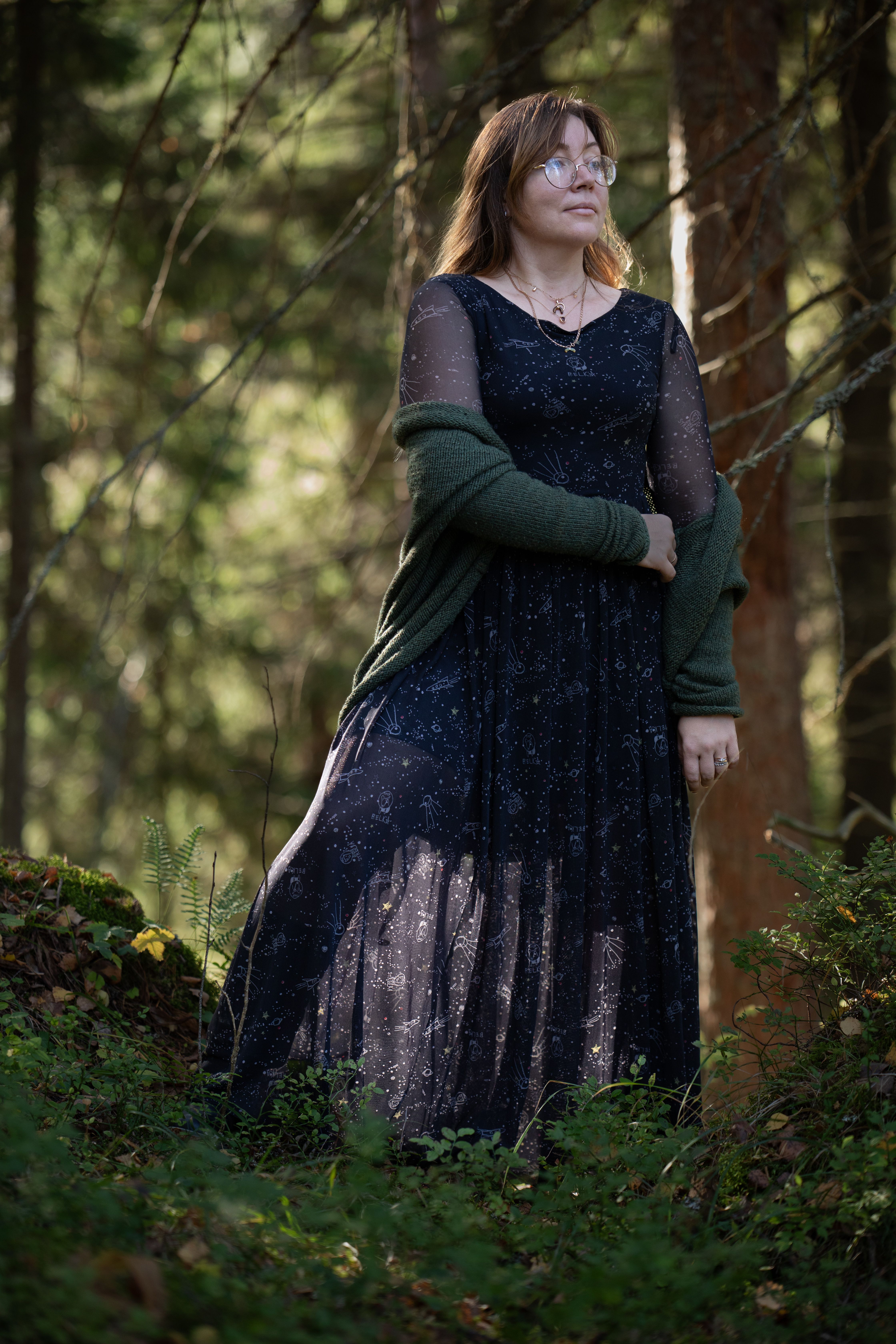 Woman in a Forest Setting with Sunlight · Free Stock Photo