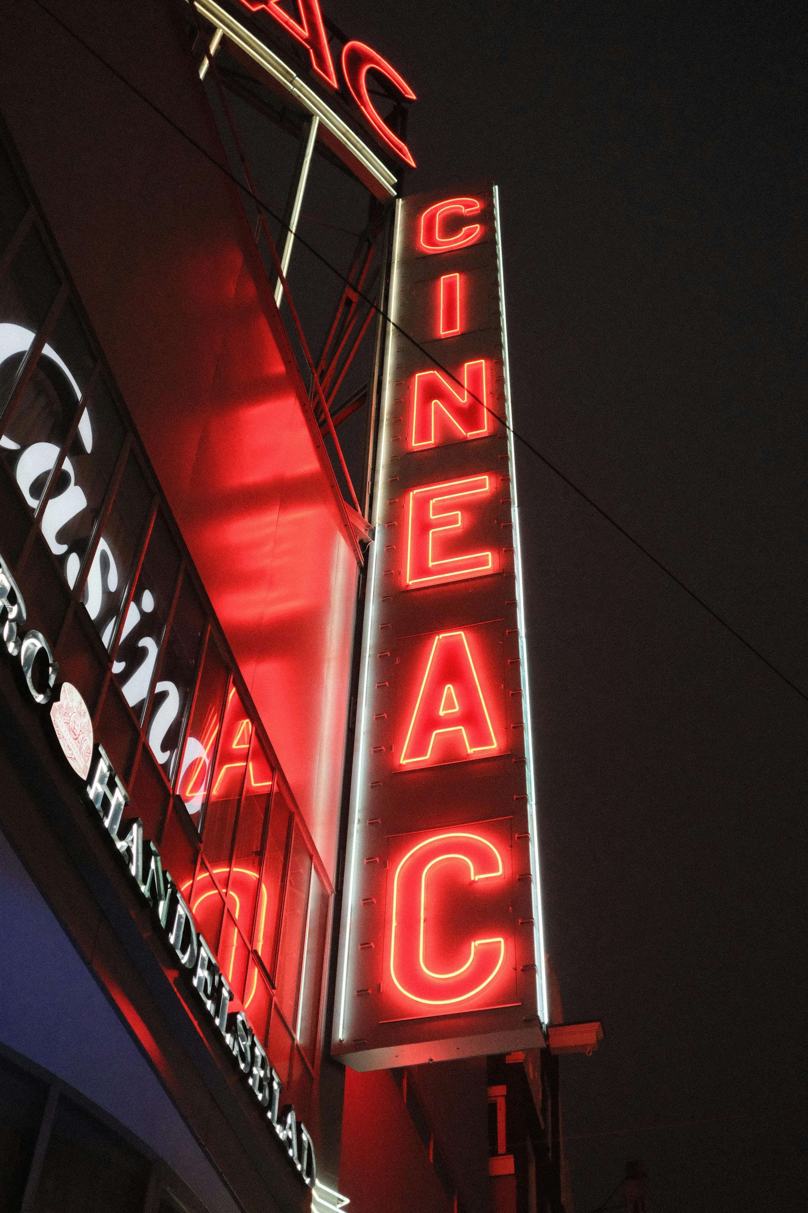 neon lights of cineac sign in amsterdam night