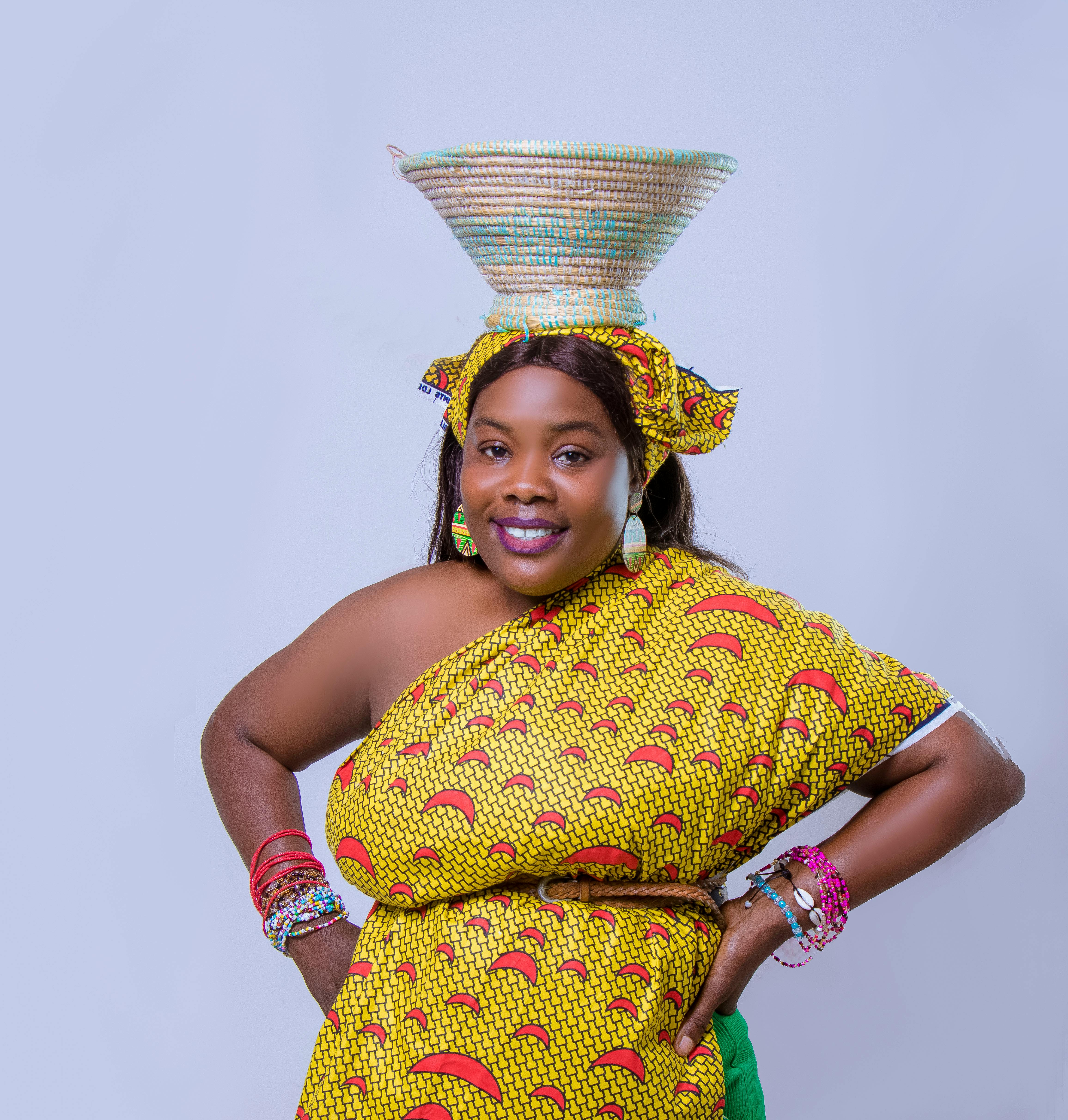 traditional african attire portrait with basket