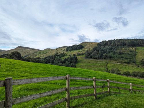 Free Stunning view of green hills and valleys in the English countryside under a bright summer sky. Stock Photo