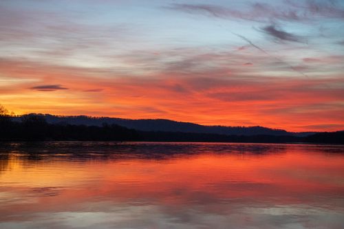 Free Beautiful sunset view over the Mississippi River in Wabasha, Minnesota, reflecting vibrant colors. Stock Photo