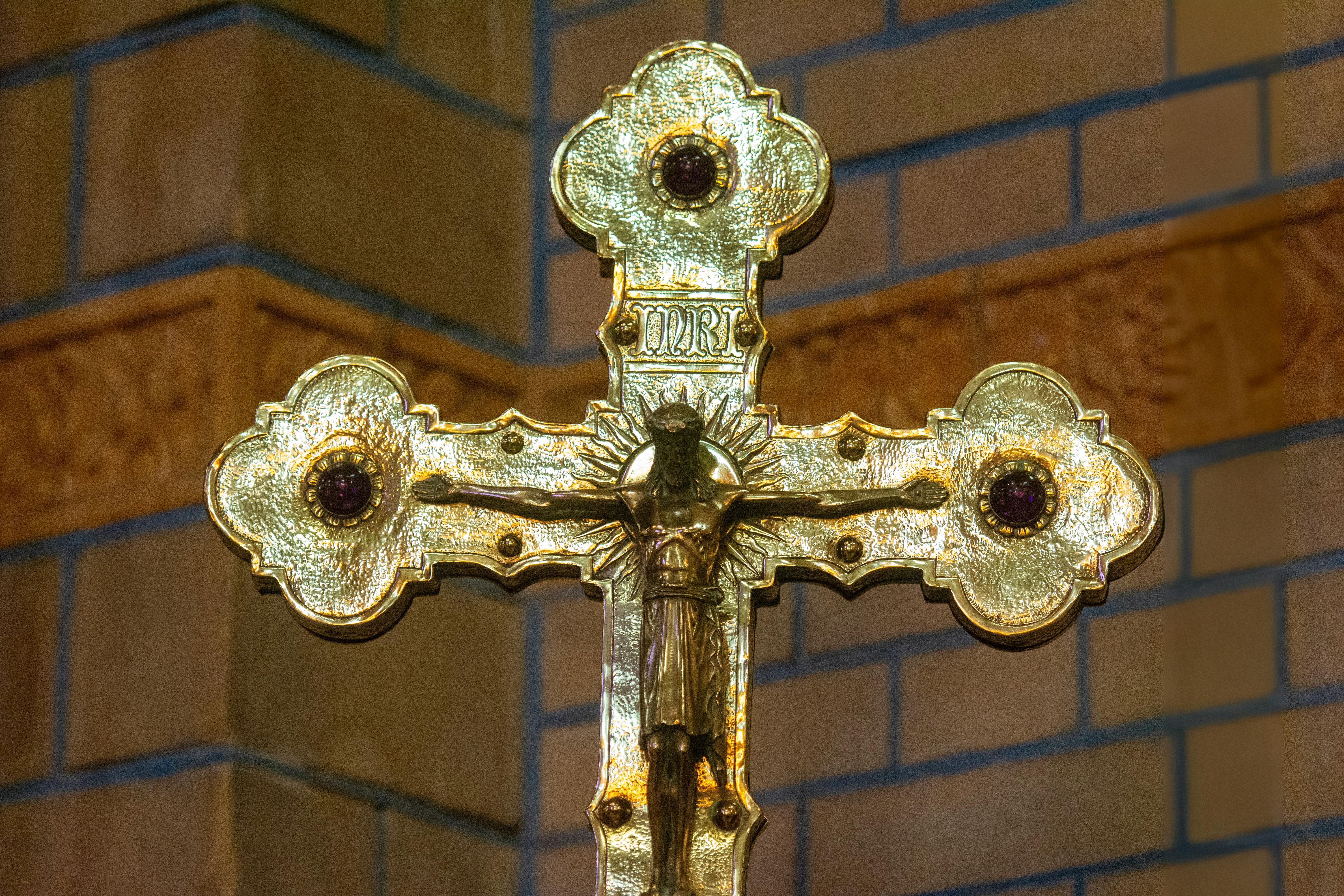 golden crucifix in ornate church setting