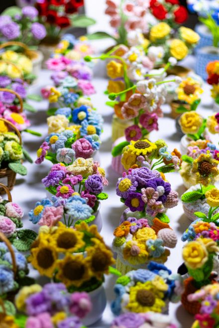 Handmade crochet flowers gathered into bouquets — photo by Anurag Jamwal on Pexels