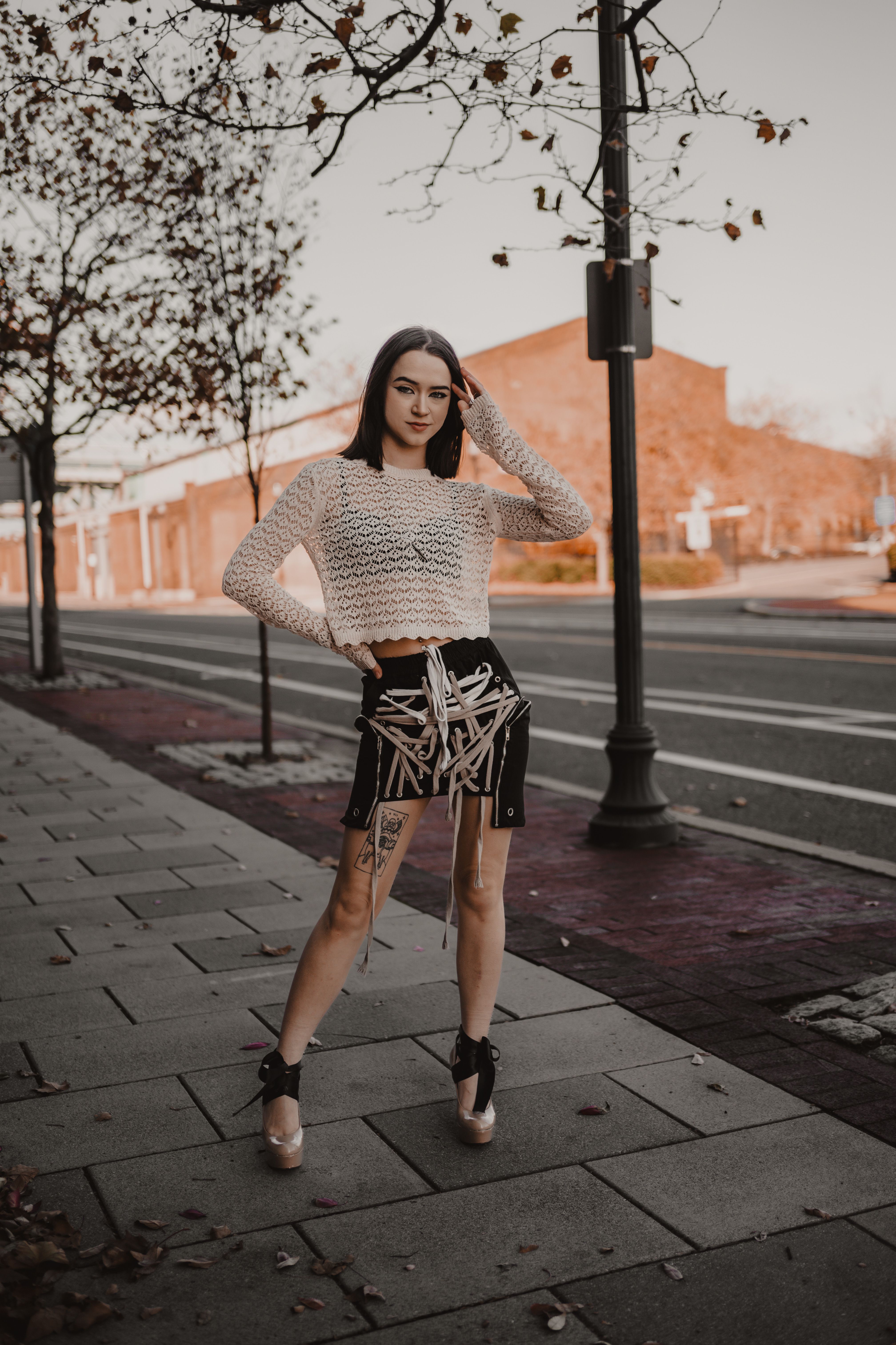 Fashionable Woman Posing on City Street in Autumn · Free Stock Photo