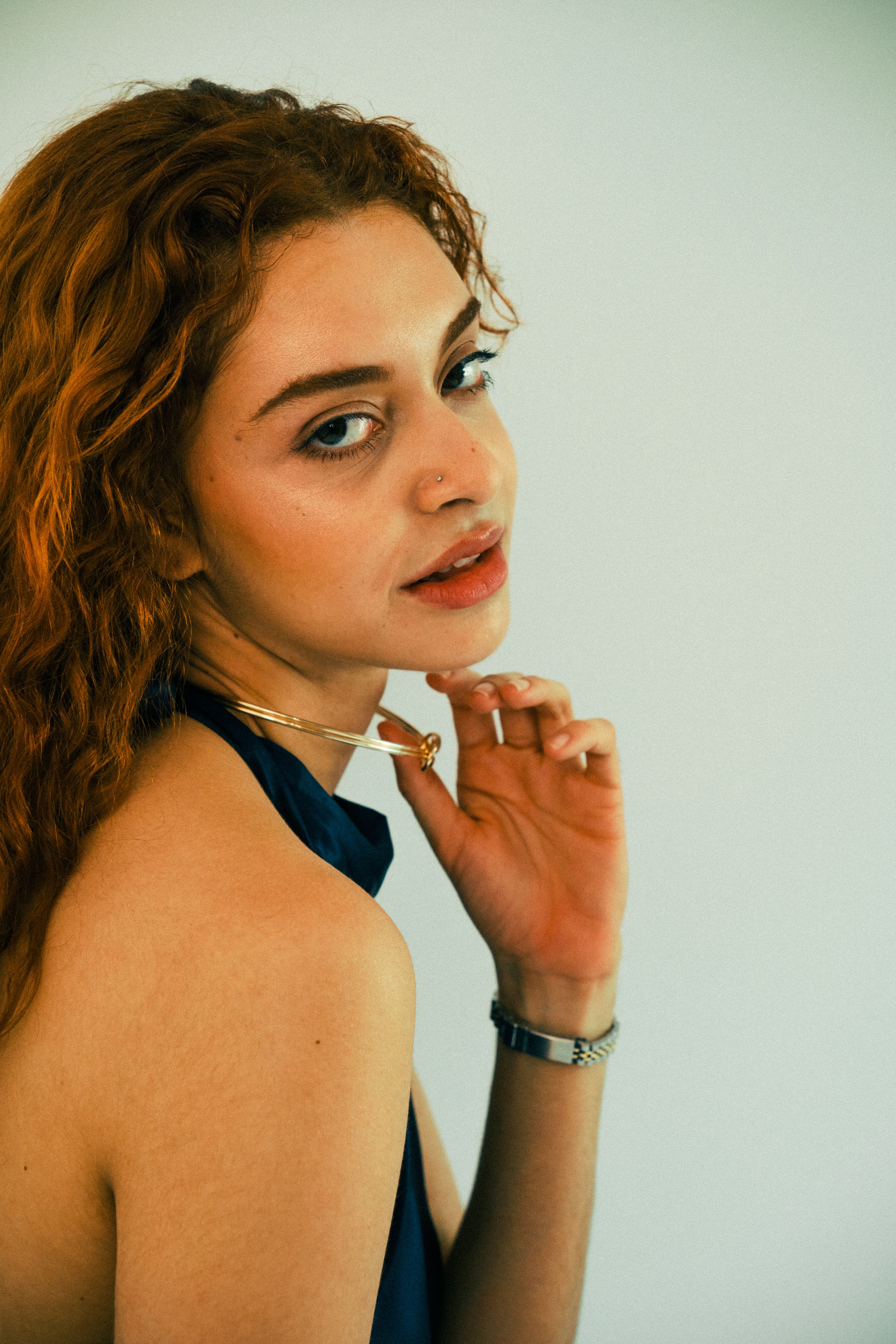 Stylish Portrait of a Young Woman with Red Hair · Free Stock Photo